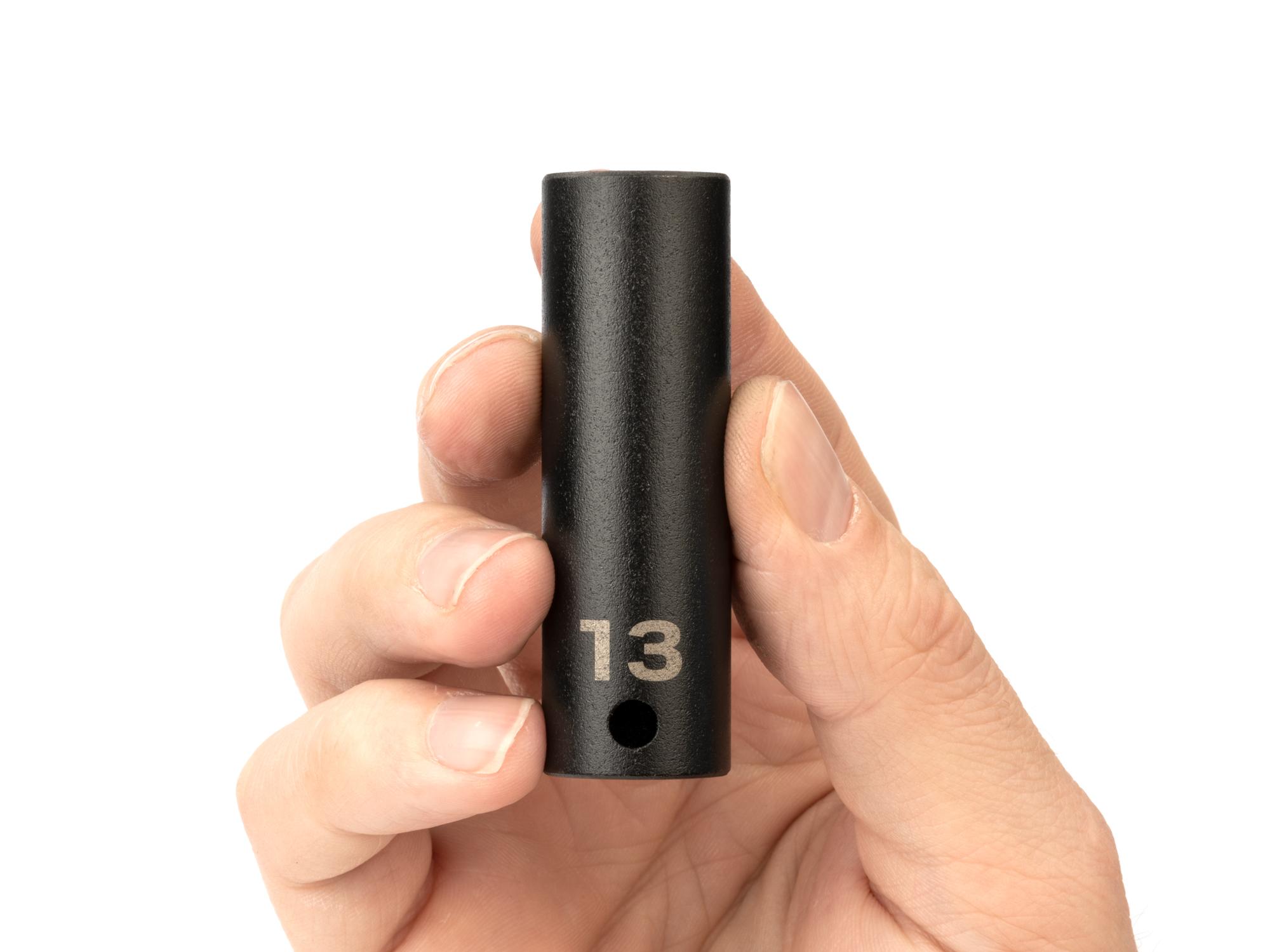 Person holding Tekton impact drive 6-point socket. Item #SID13113