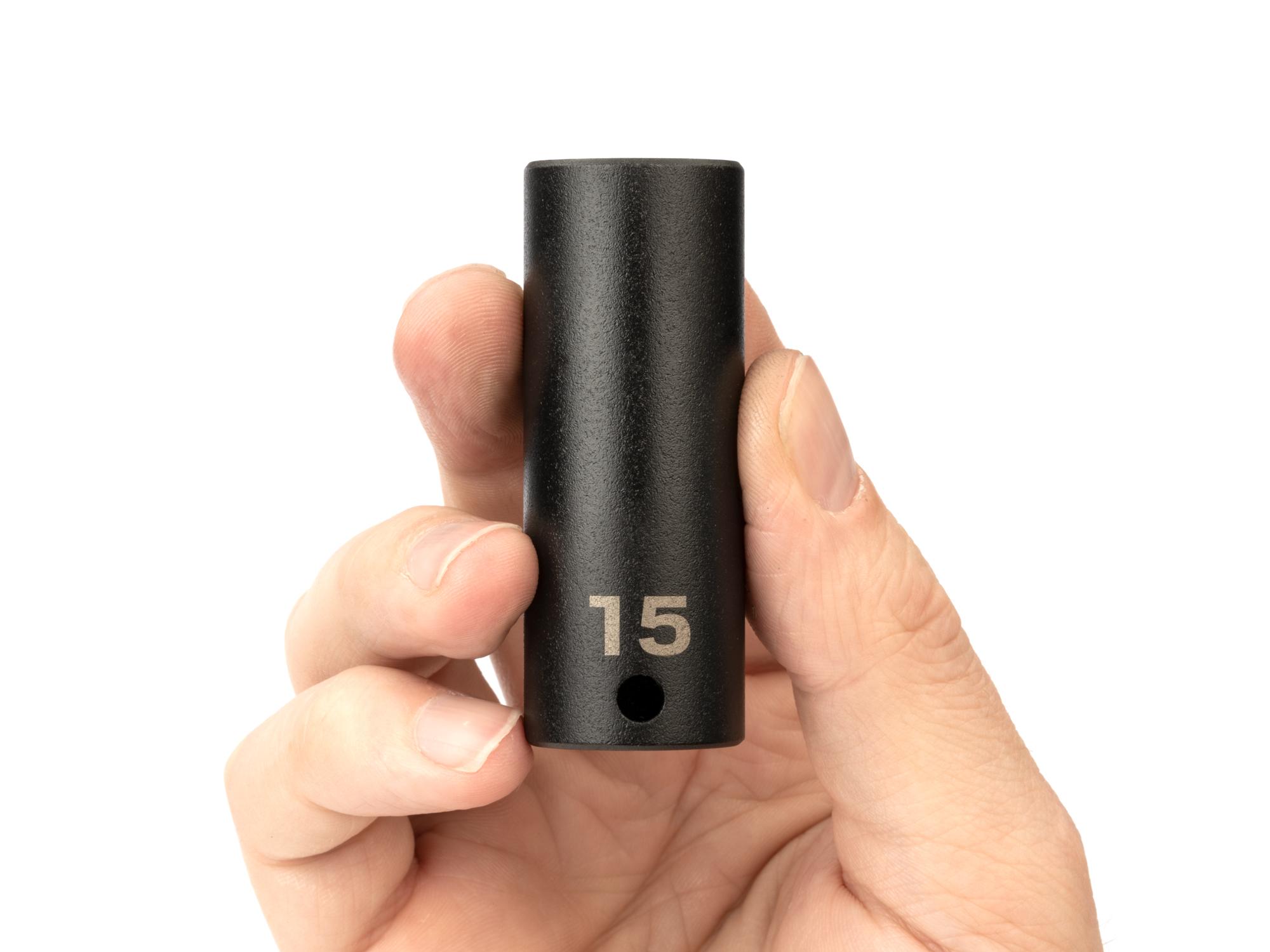 Person holding Tekton impact drive 6-point socket. Item #SID13115