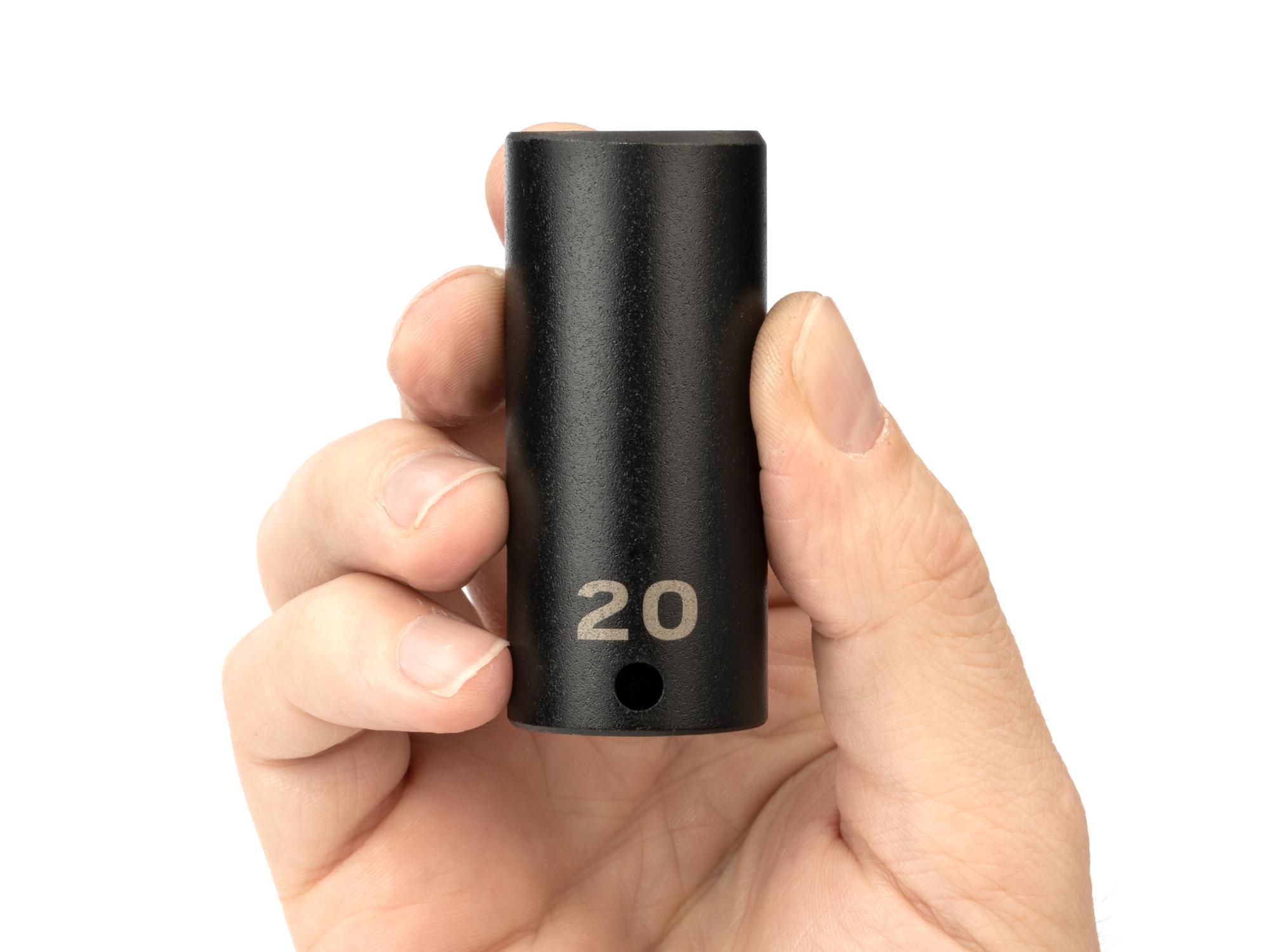 Person holding Tekton impact drive 6-point socket. Item #SID13120