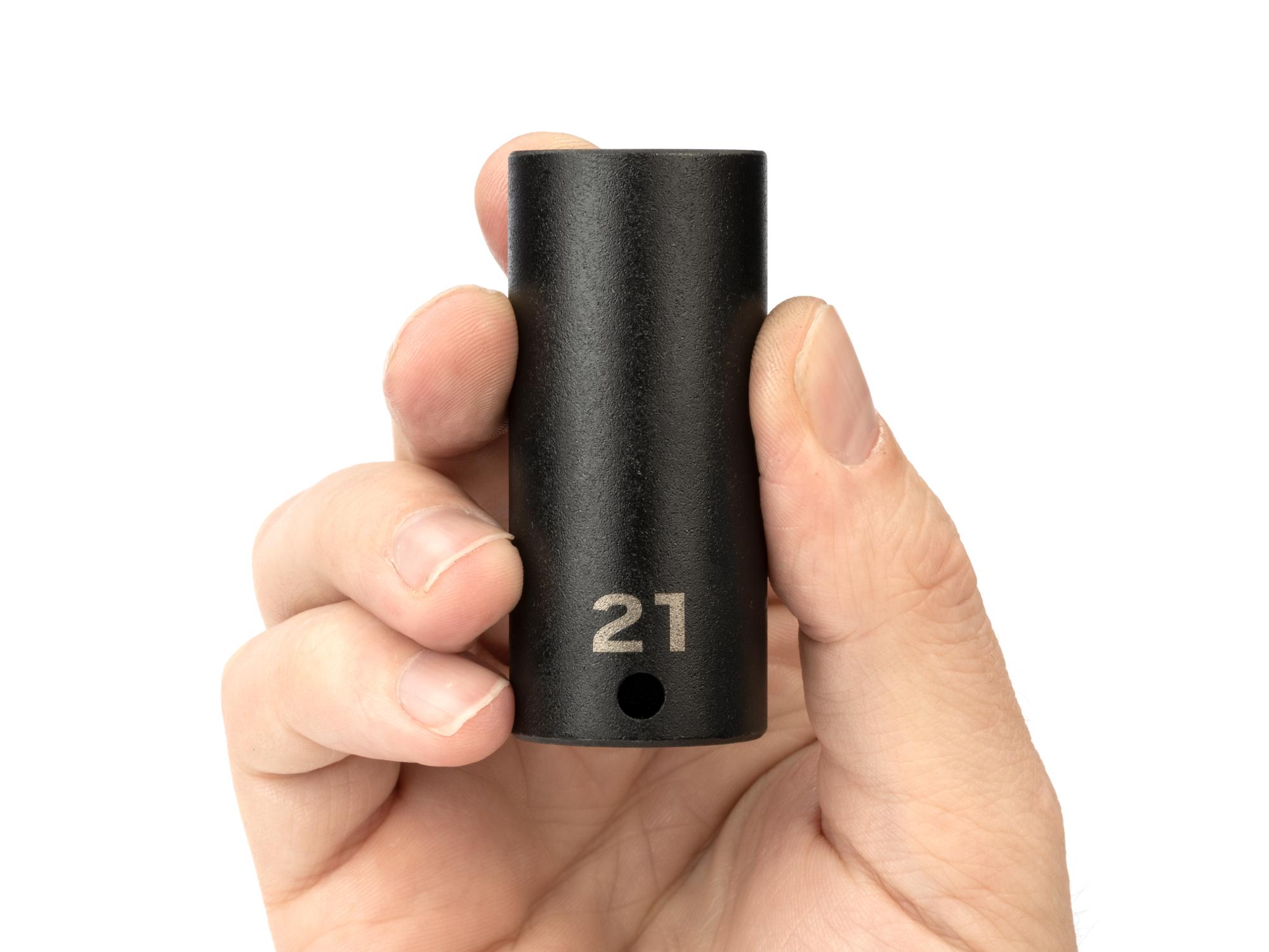 Person holding Tekton impact drive 6-point socket. Item #SID13121