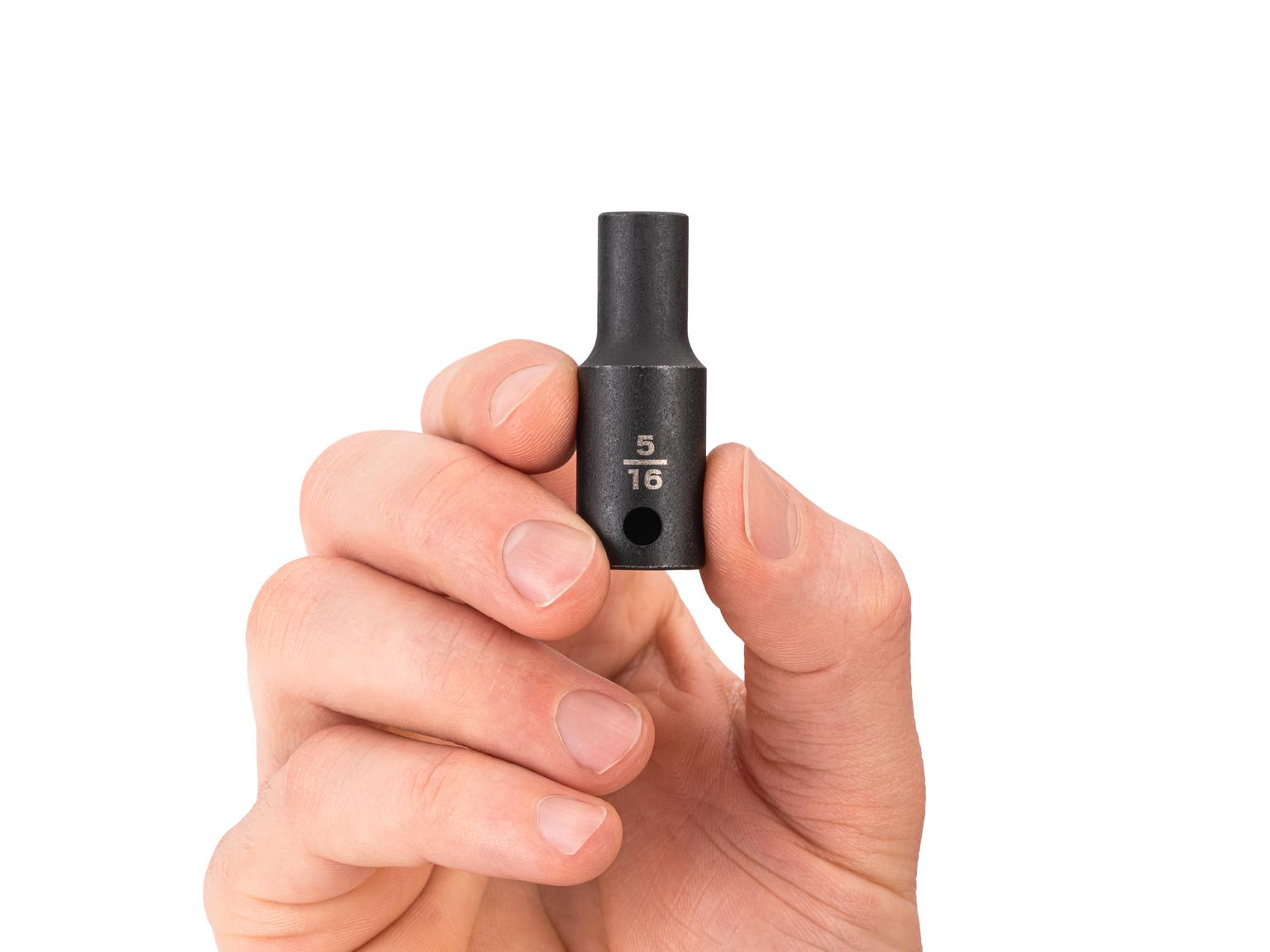 Person holding Tekton 5/16 inch impact drive 6-point socket. Item #SID14008