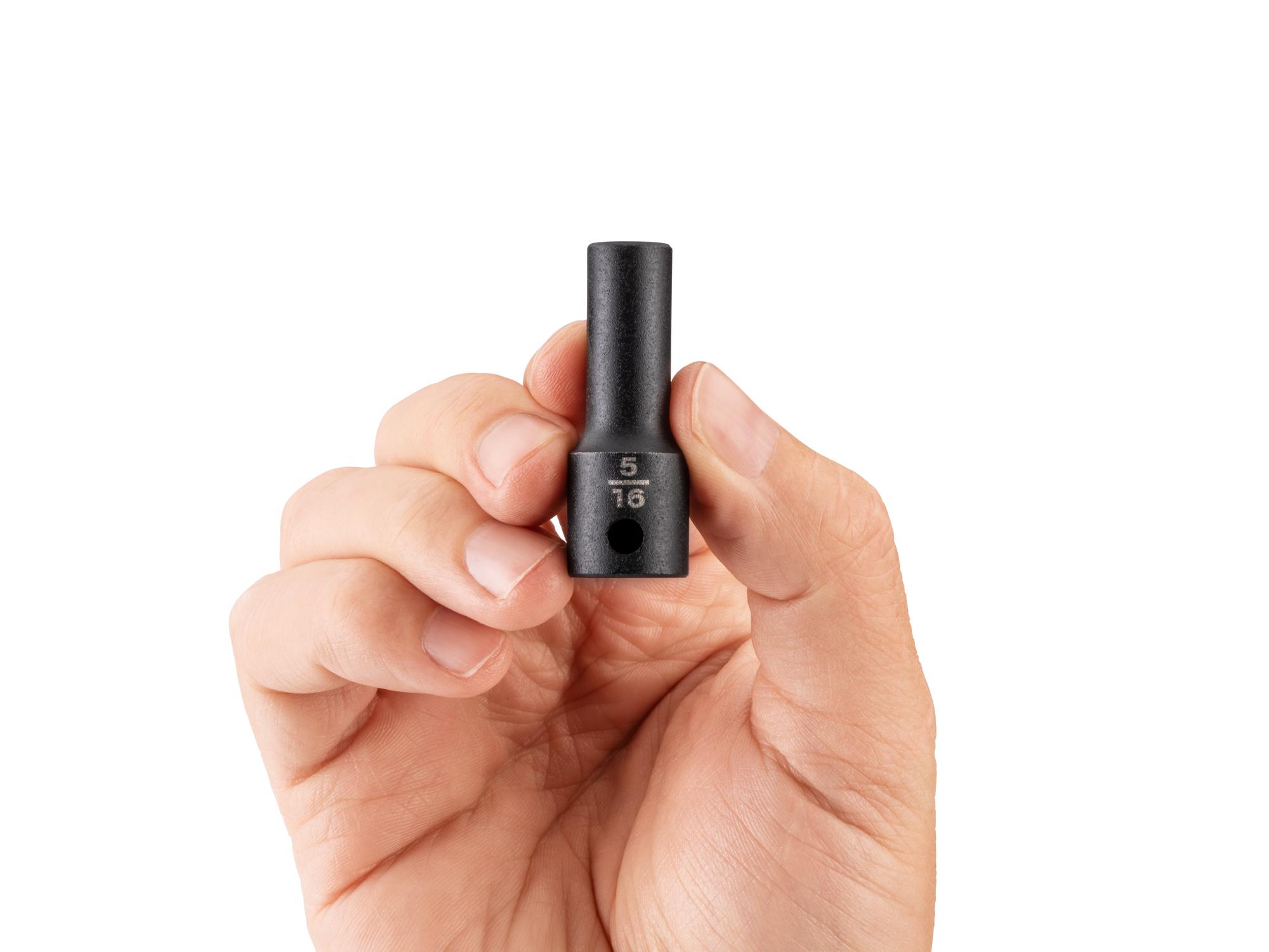 Person holding Tekton impact drive 6-point socket. Item #SID14008