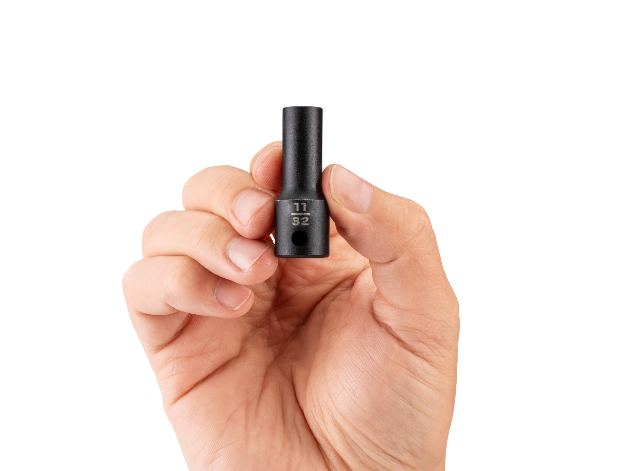 Person holding Tekton impact drive 6-point socket. Item #SID14009