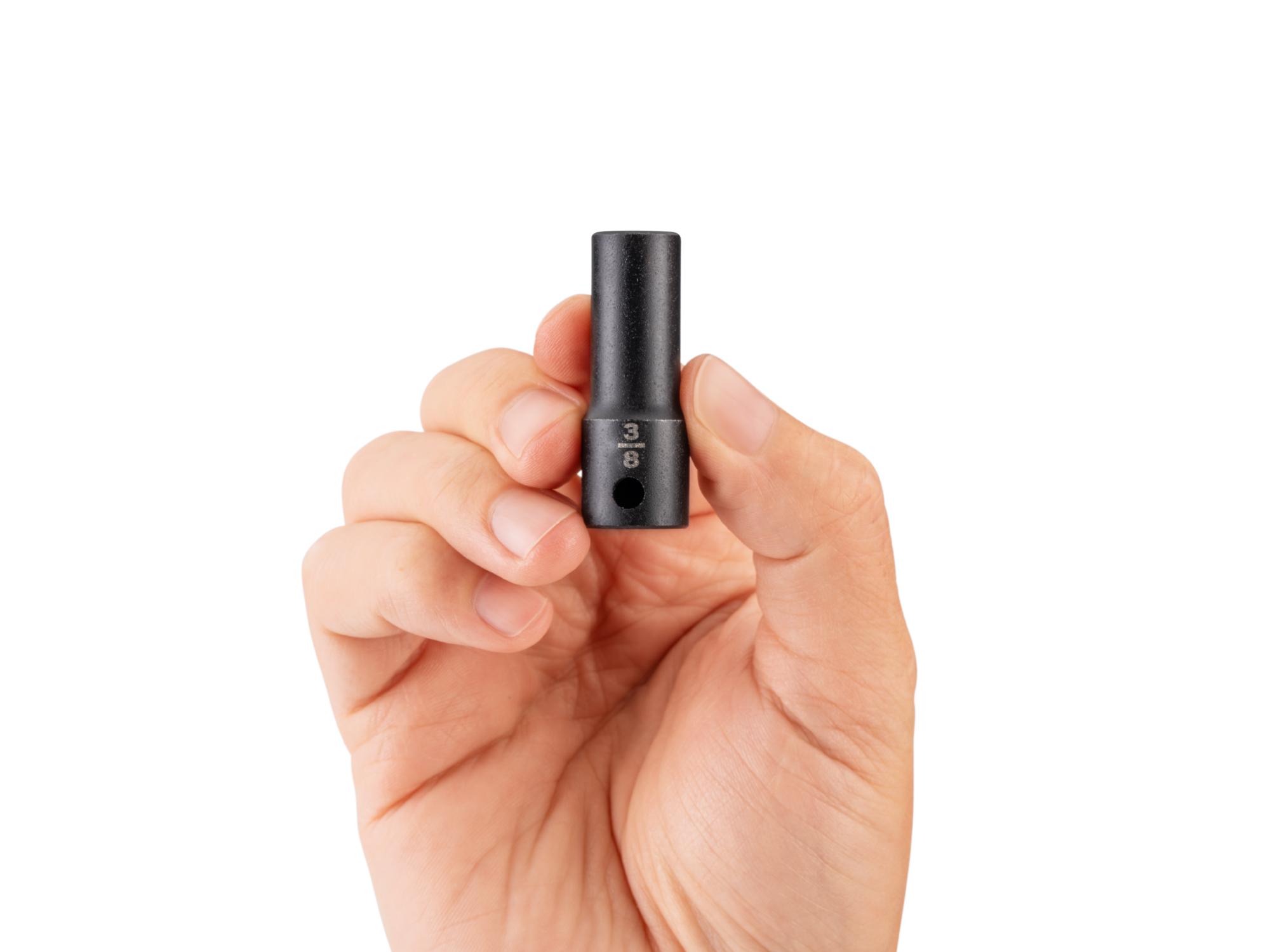 Person holding Tekton impact drive 6-point socket. Item #SID14010