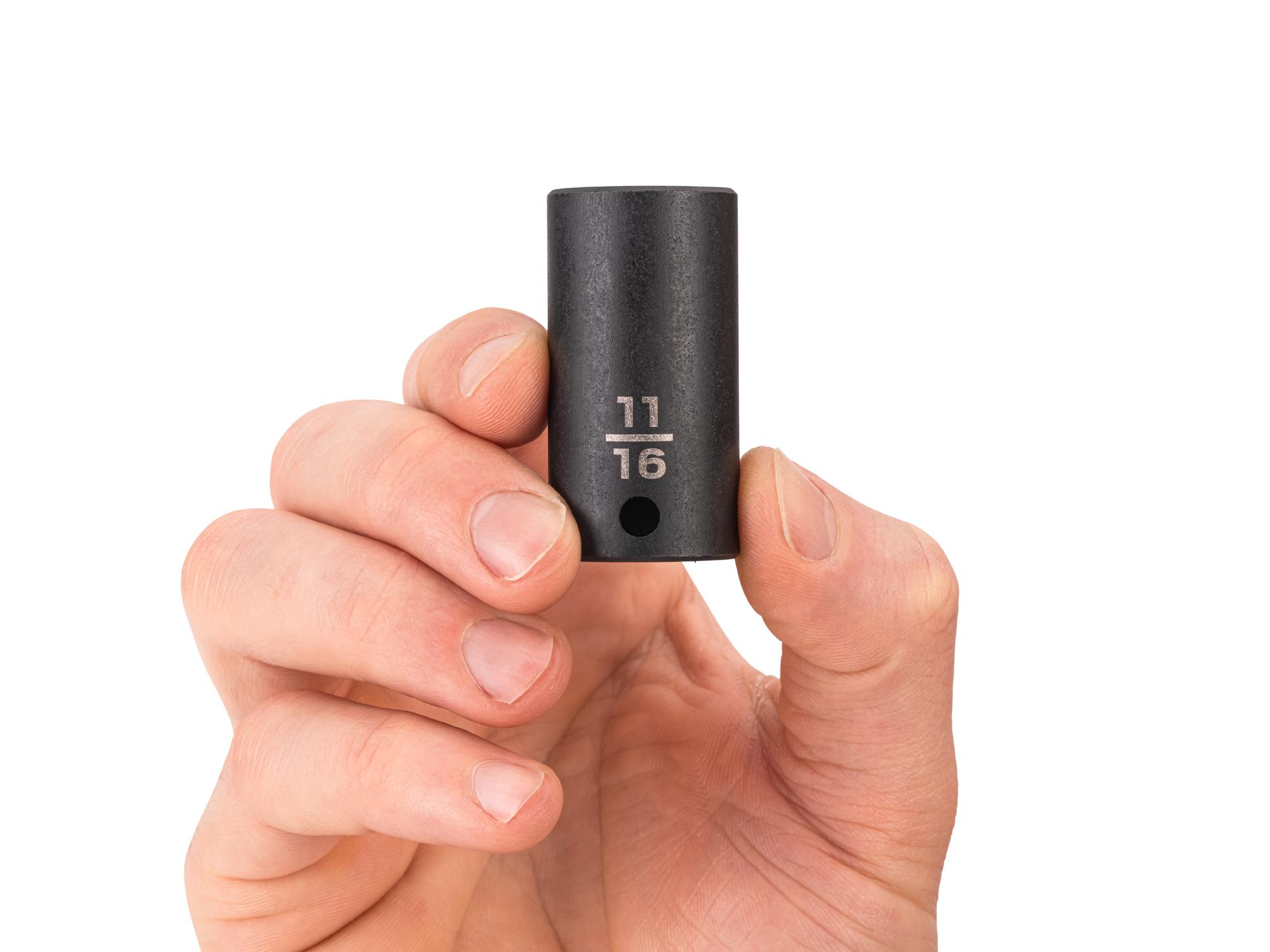 Person holding Tekton impact drive 6-point socket. Item #SID14017