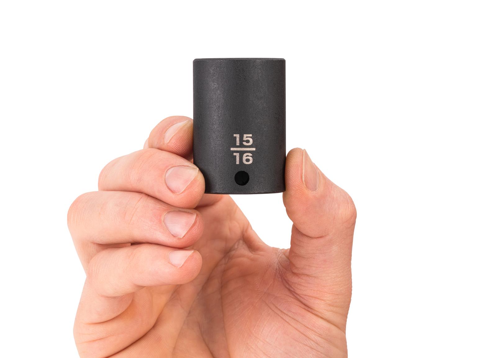 Person holding Tekton 15/16 inch impact drive 6-point socket. Item #SID14024