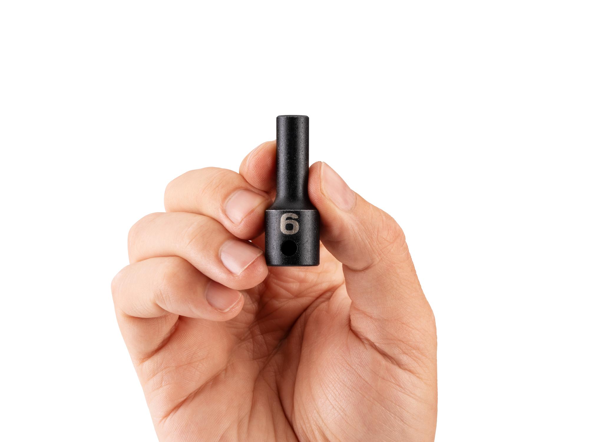 Person holding Tekton impact drive 6-point socket. Item #SID14106
