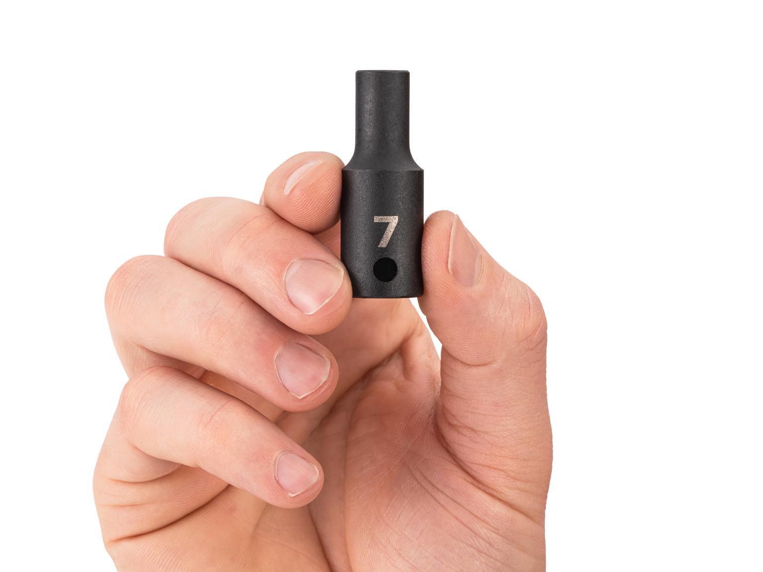Person holding Tekton 7 millimeter impact drive 6-point socket. Item #SID14107