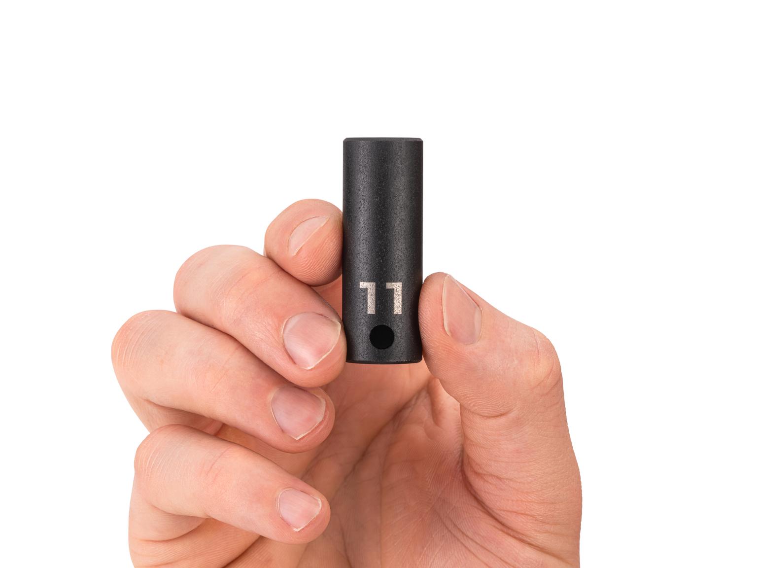 Person holding Tekton 11 millimeter impact drive 6-point socket. Item #SID14111