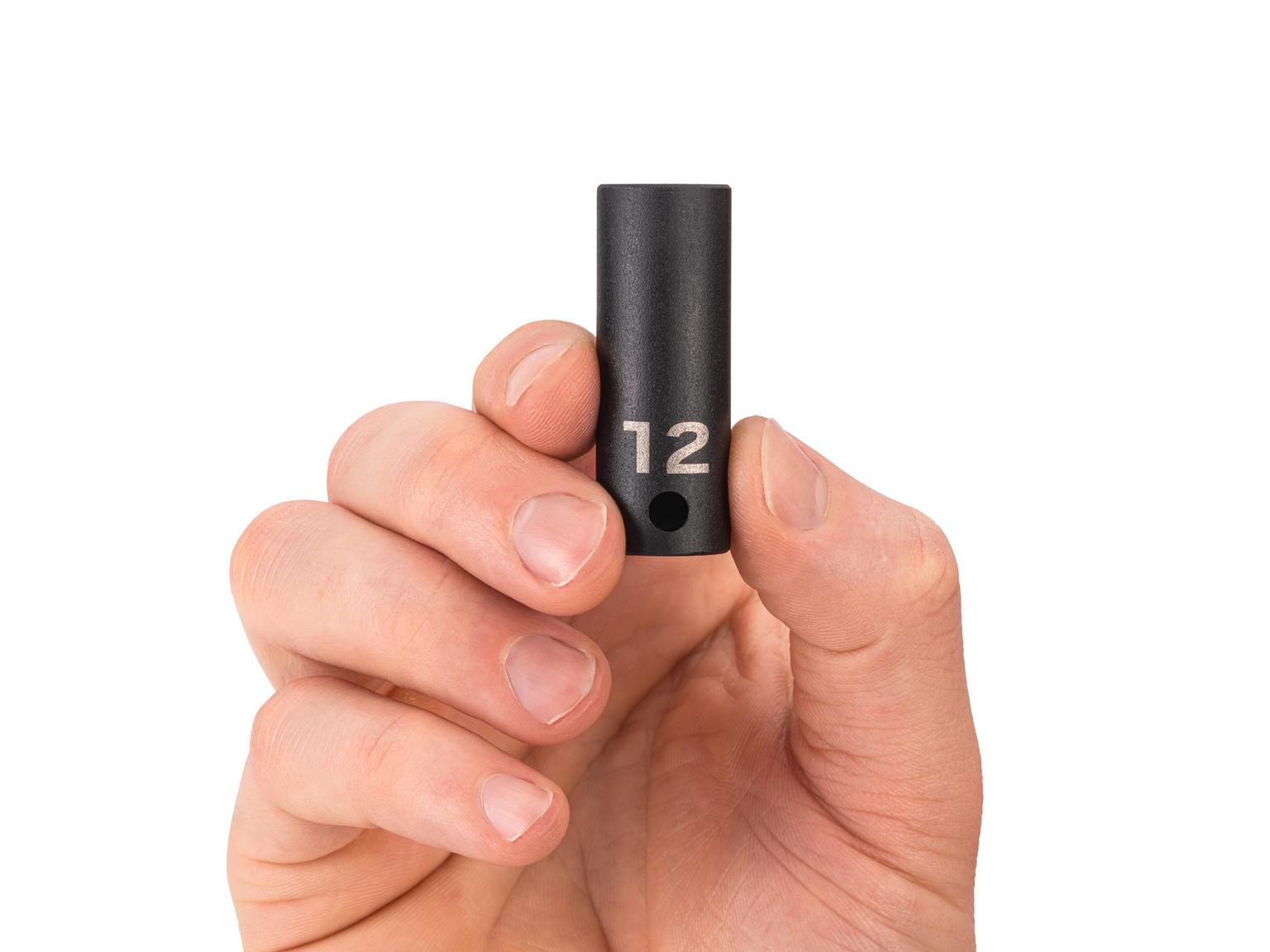 Person holding Tekton 12 millimeter impact drive 6-point socket. Item #SID14112