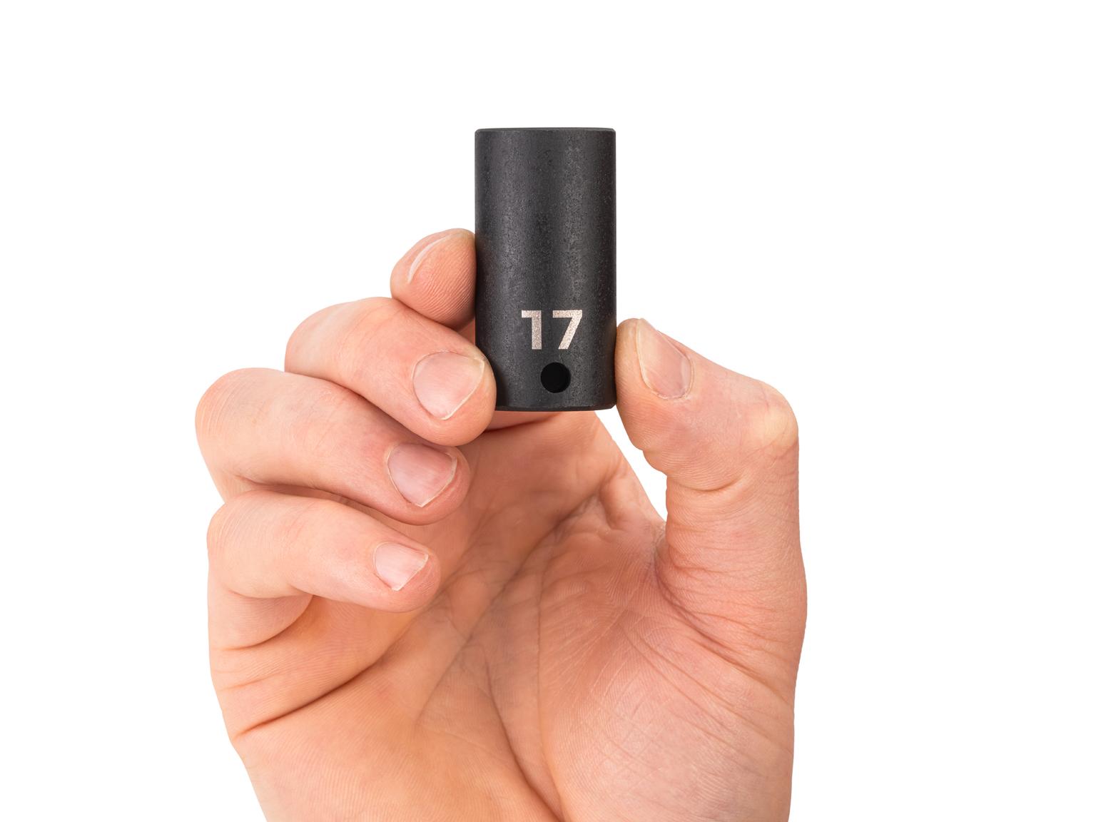Person holding Tekton 17 millimeter impact drive 6-point socket. Item #SID14117