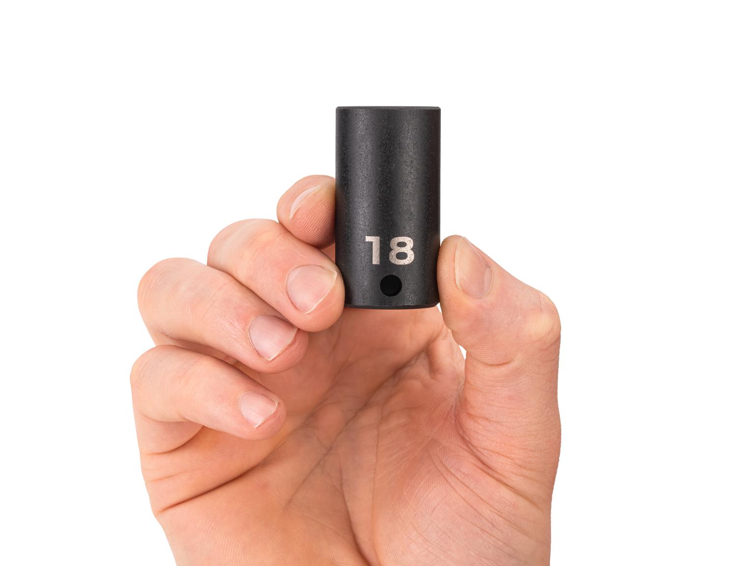 Person holding Tekton 18 millimeter impact drive 6-point socket. Item #SID14118