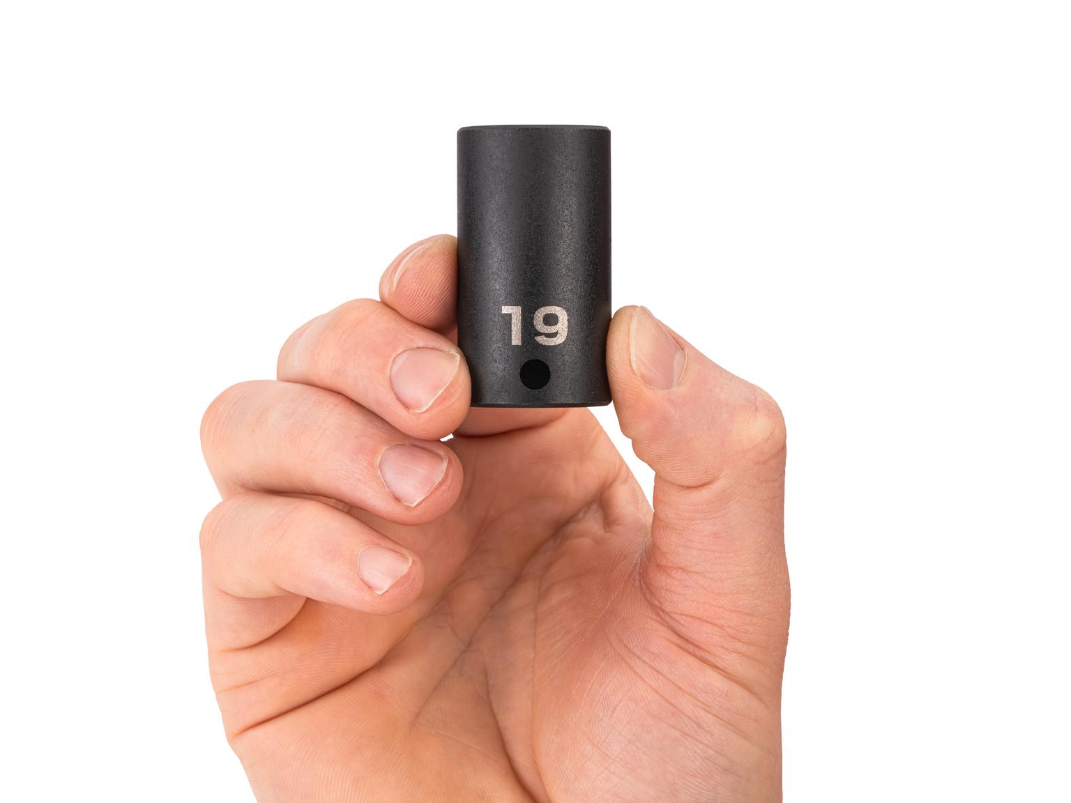 Person holding Tekton 19 millimeter impact drive 6-point socket. Item #SID14119