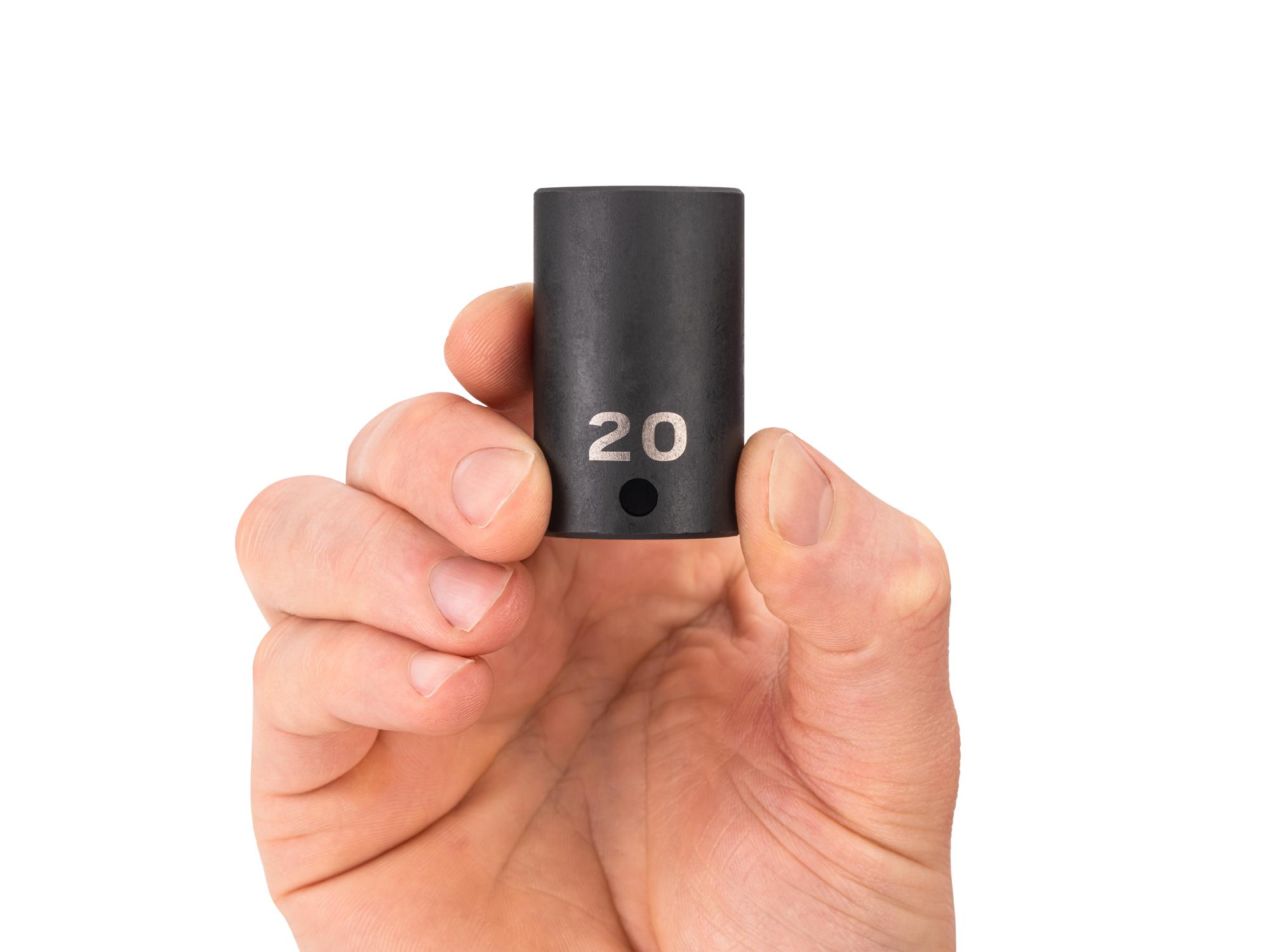 Person holding Tekton impact drive 6-point socket. Item #SID14120