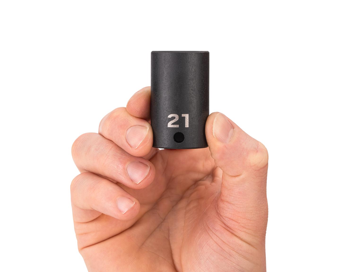 Person holding Tekton 21 millimeter impact drive 6-point socket. Item #SID14121