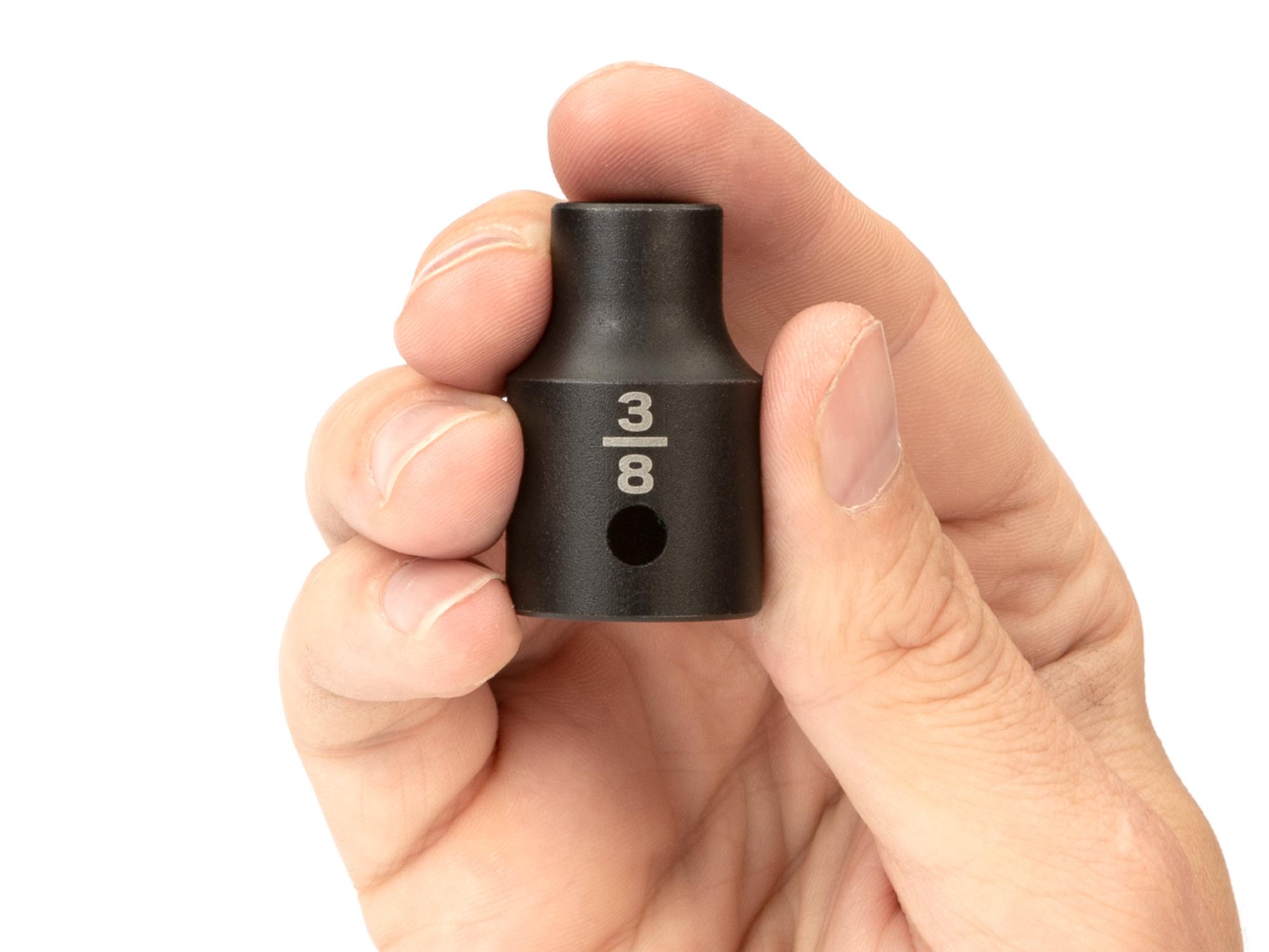 Person holding Tekton impact drive 6-point socket. Item #SID22010