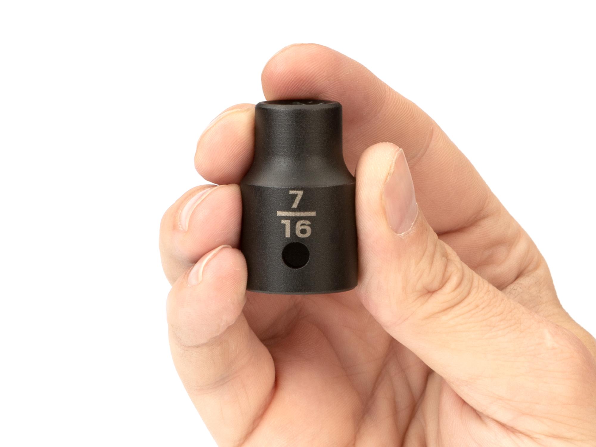Person holding Tekton impact drive 6-point socket. Item #SID22011