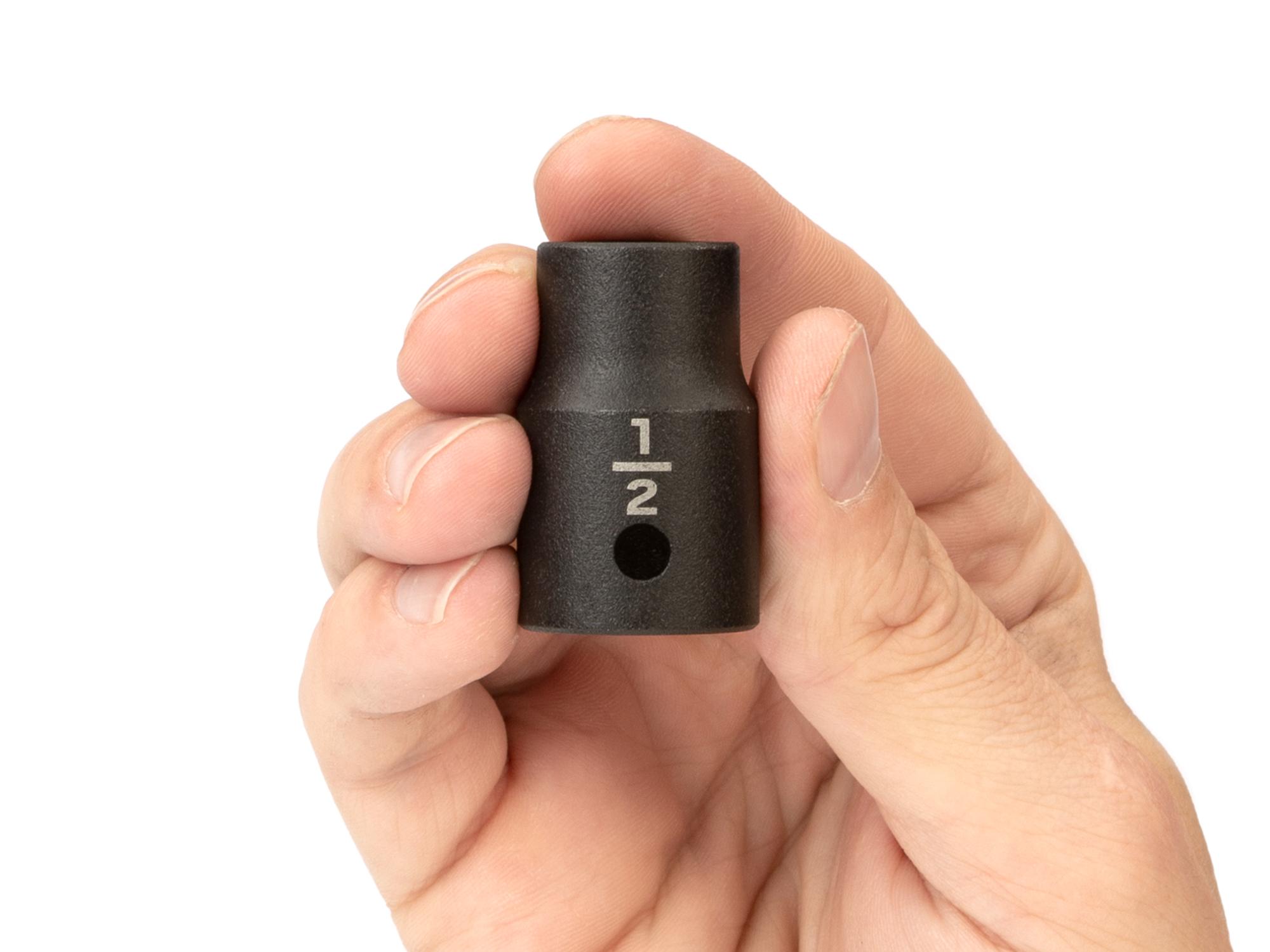 Person holding Tekton impact drive 6-point socket. Item #SID22013