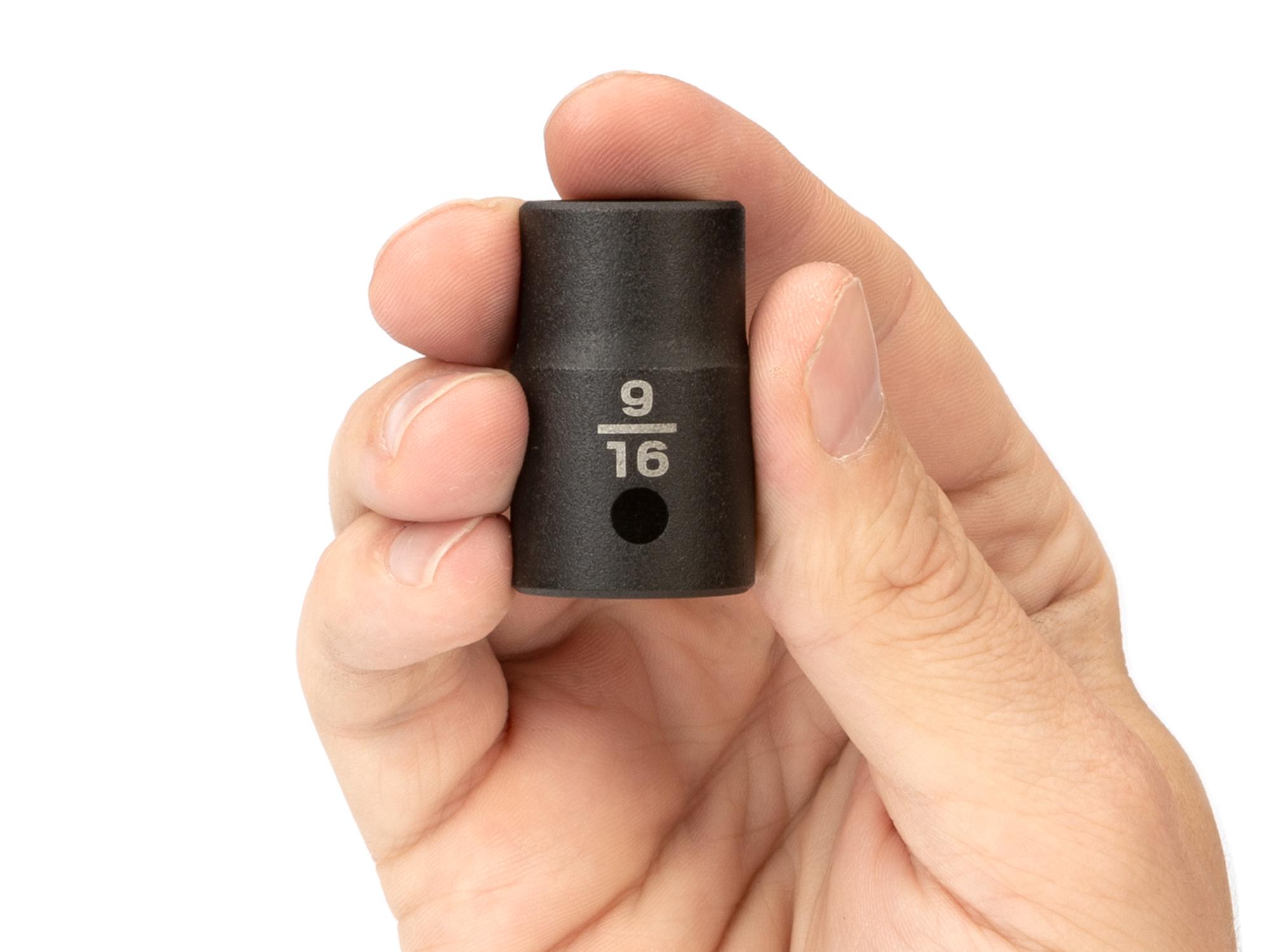 Person holding Tekton impact drive 6-point socket. Item #SID22014
