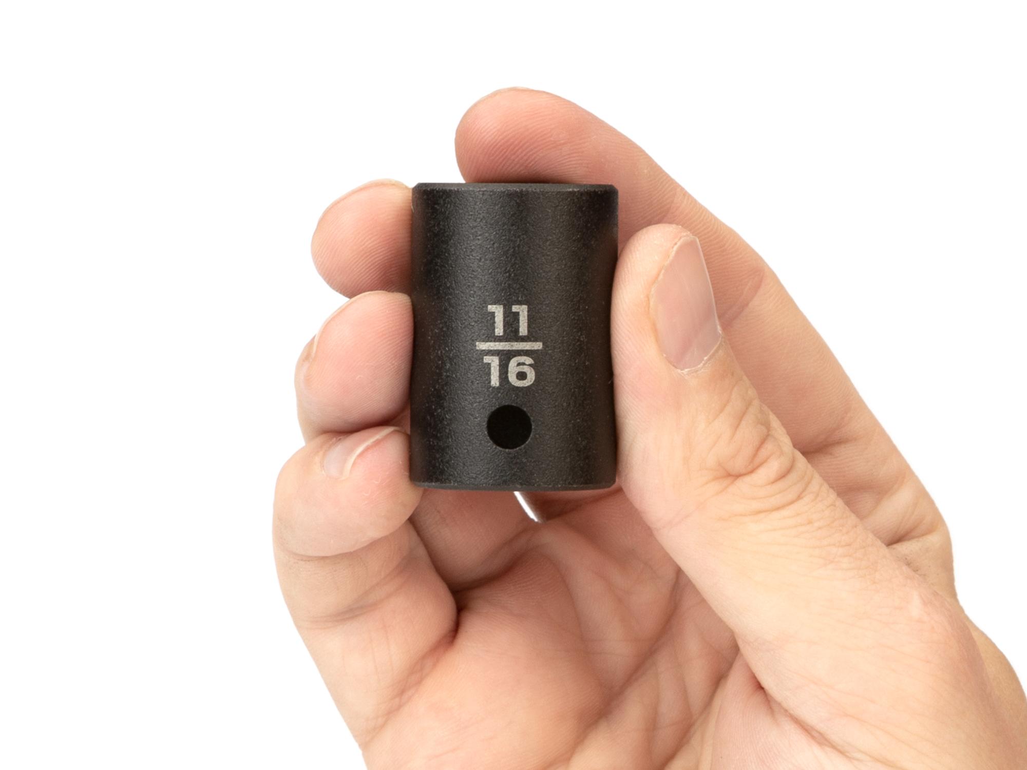 Person holding Tekton impact drive 6-point socket. Item #SID22017
