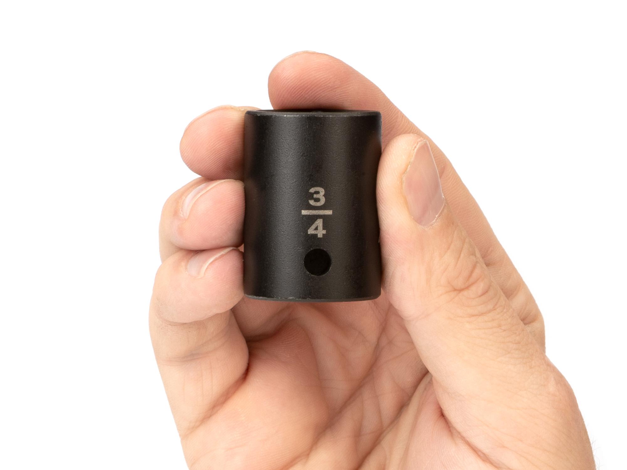 Person holding Tekton impact drive 6-point socket. Item #SID22019