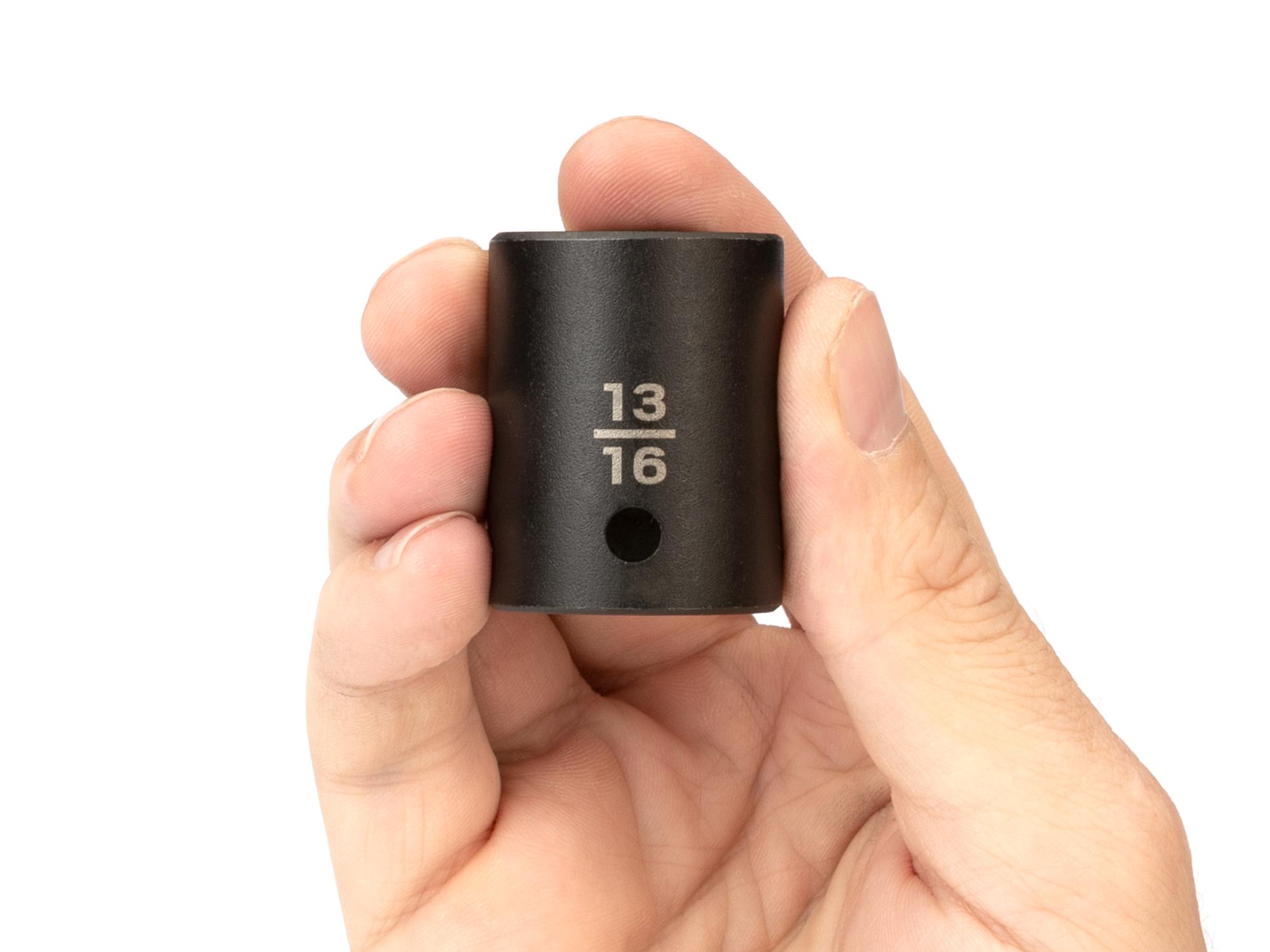 Person holding Tekton impact drive 6-point socket. Item #SID22021