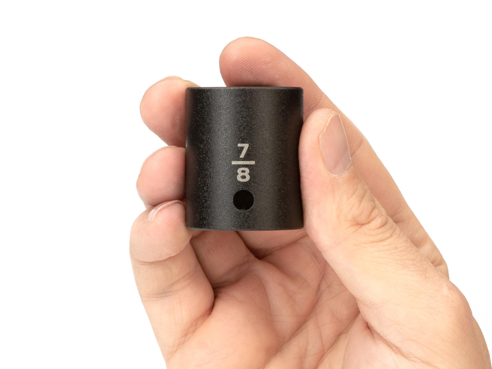 Person holding Tekton impact drive 6-point socket. Item #SID22022