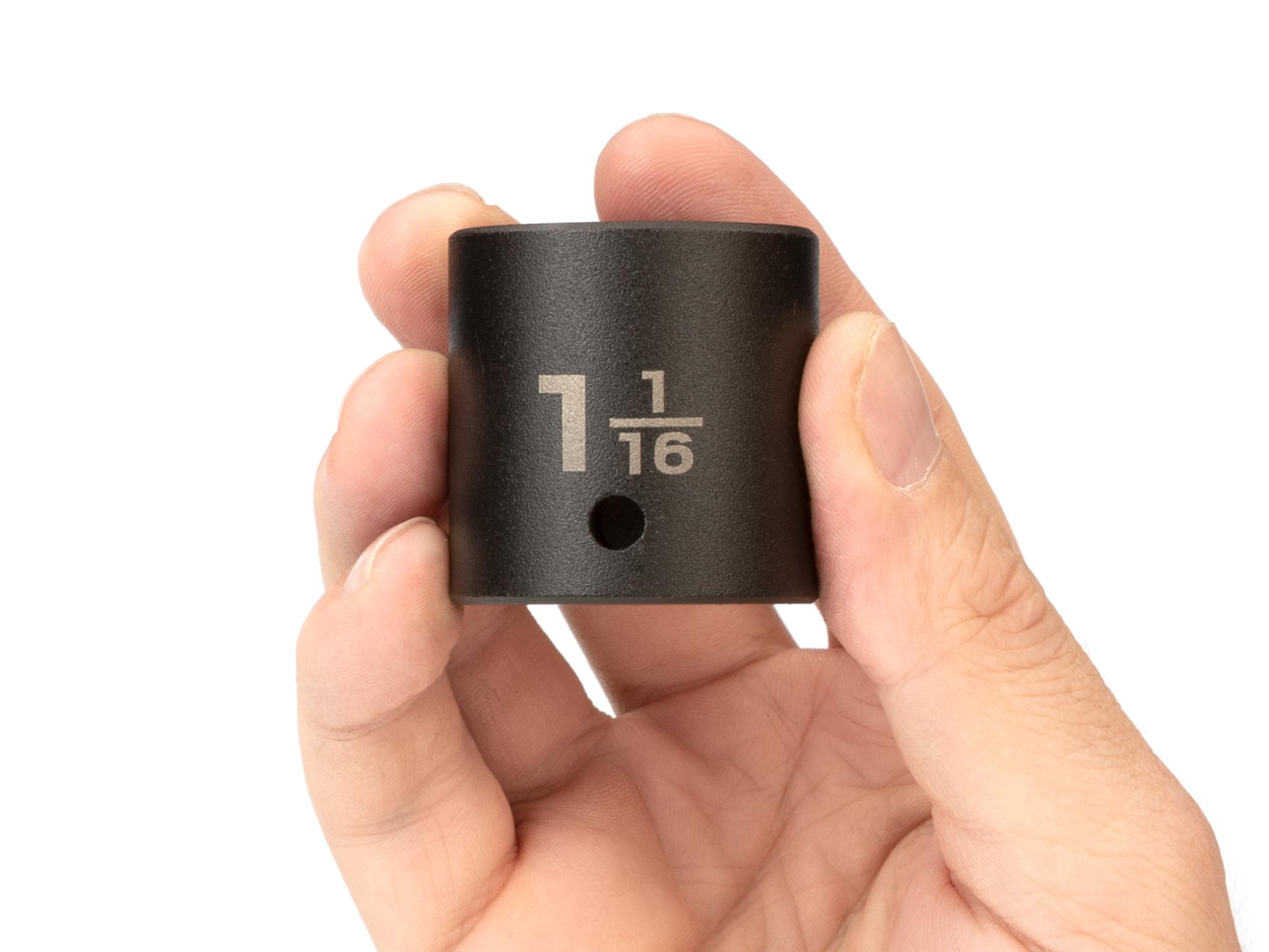 Person holding Tekton impact drive 6-point socket. Item #SID22027