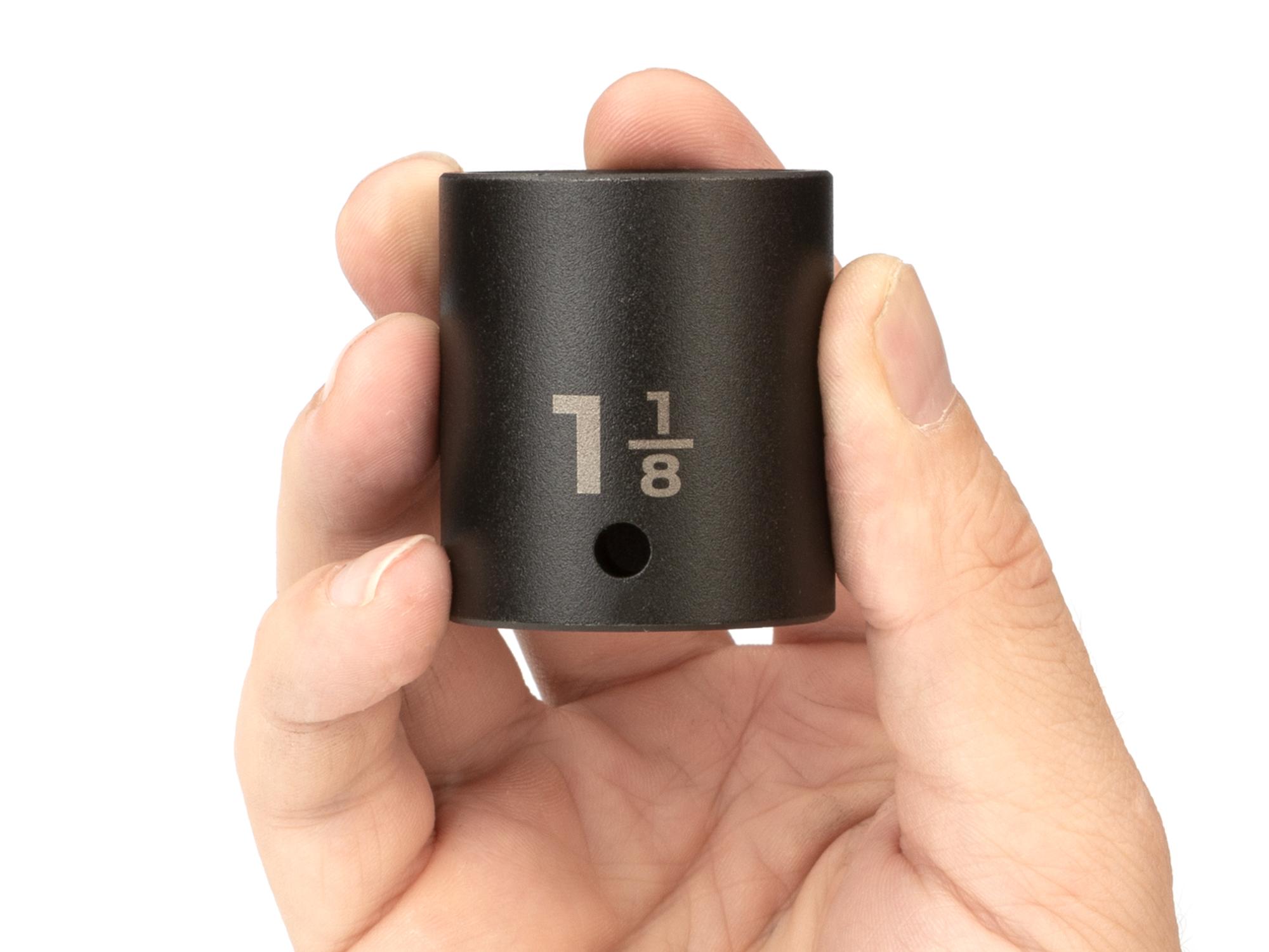 Person holding Tekton impact drive 6-point socket. Item #SID22029