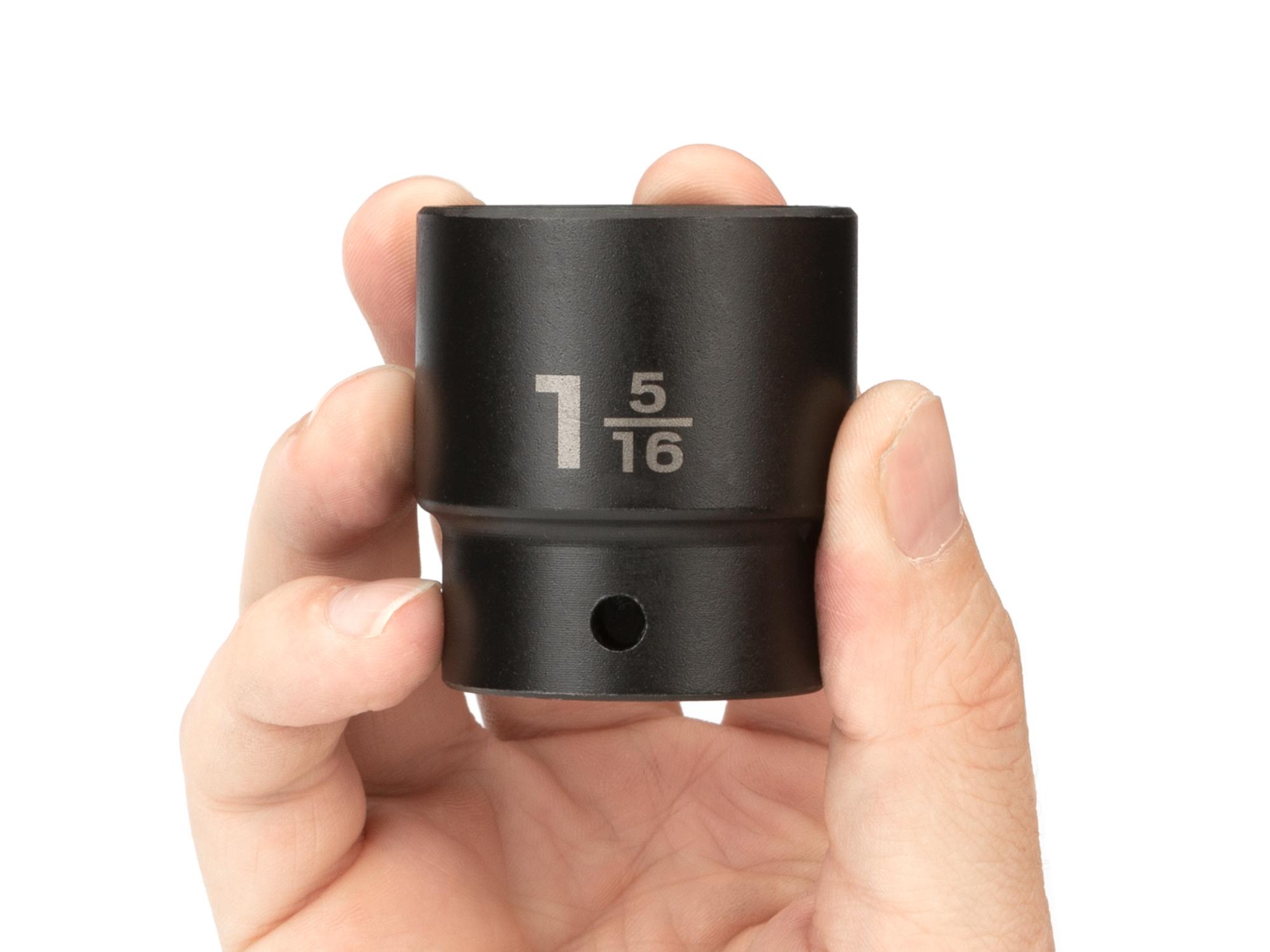 Person holding Tekton impact drive 6-point socket. Item #SID22033