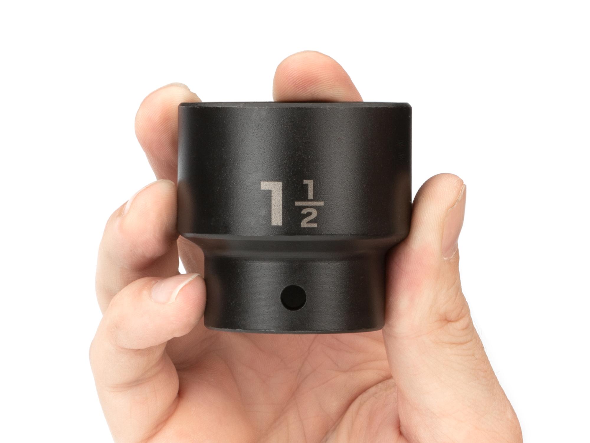 Person holding Tekton impact drive 6-point socket. Item #SID22038