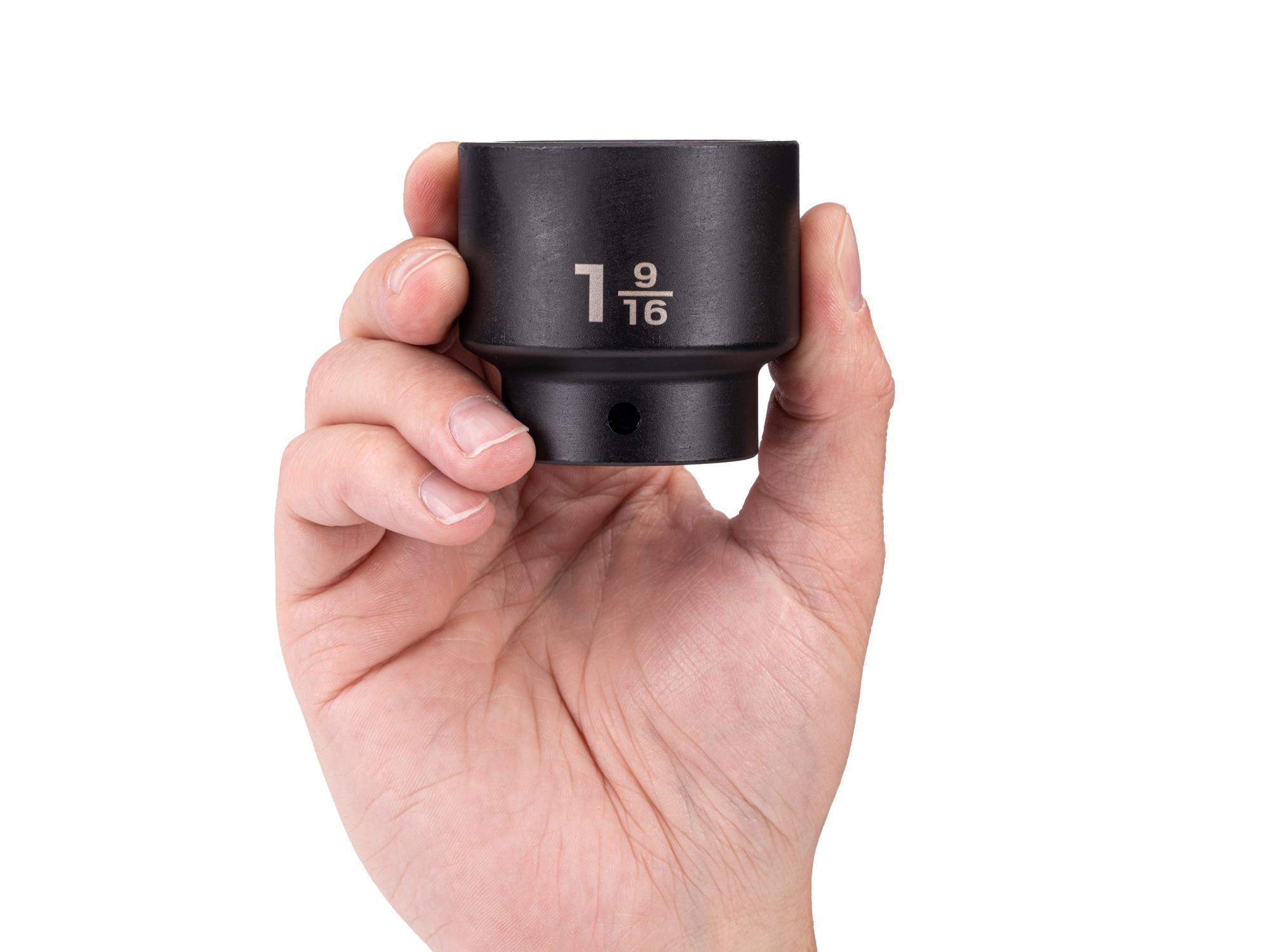Person holding Tekton impact drive 6-point socket. Item #SID22040