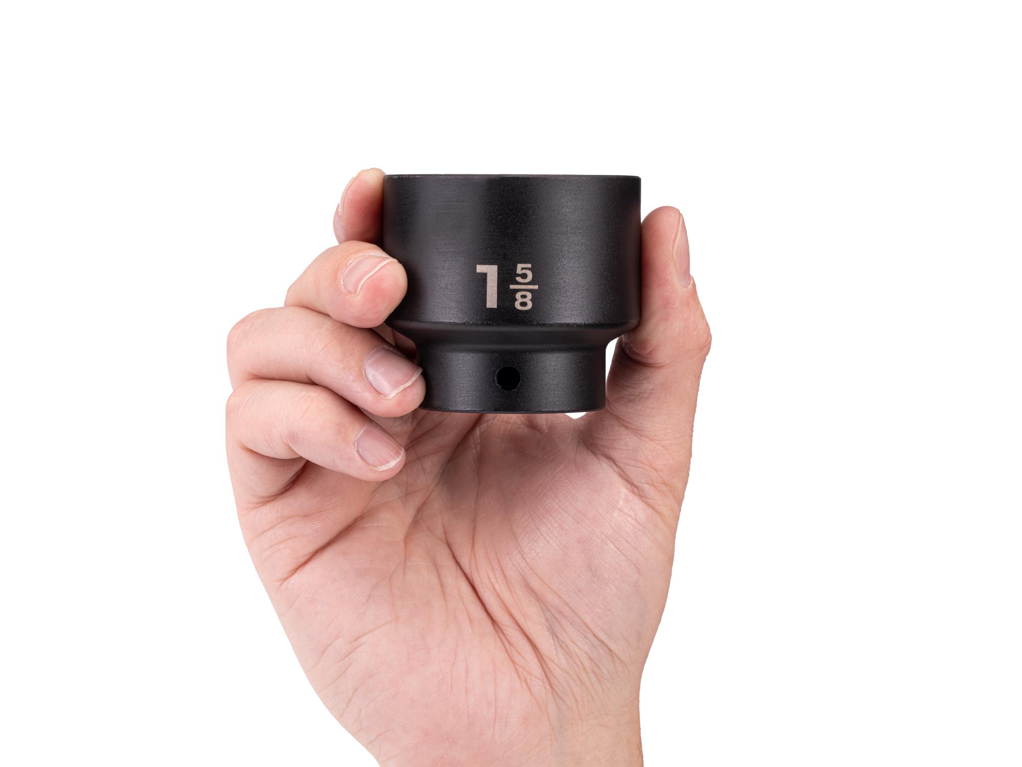 Person holding Tekton impact drive 6-point socket. Item #SID22041