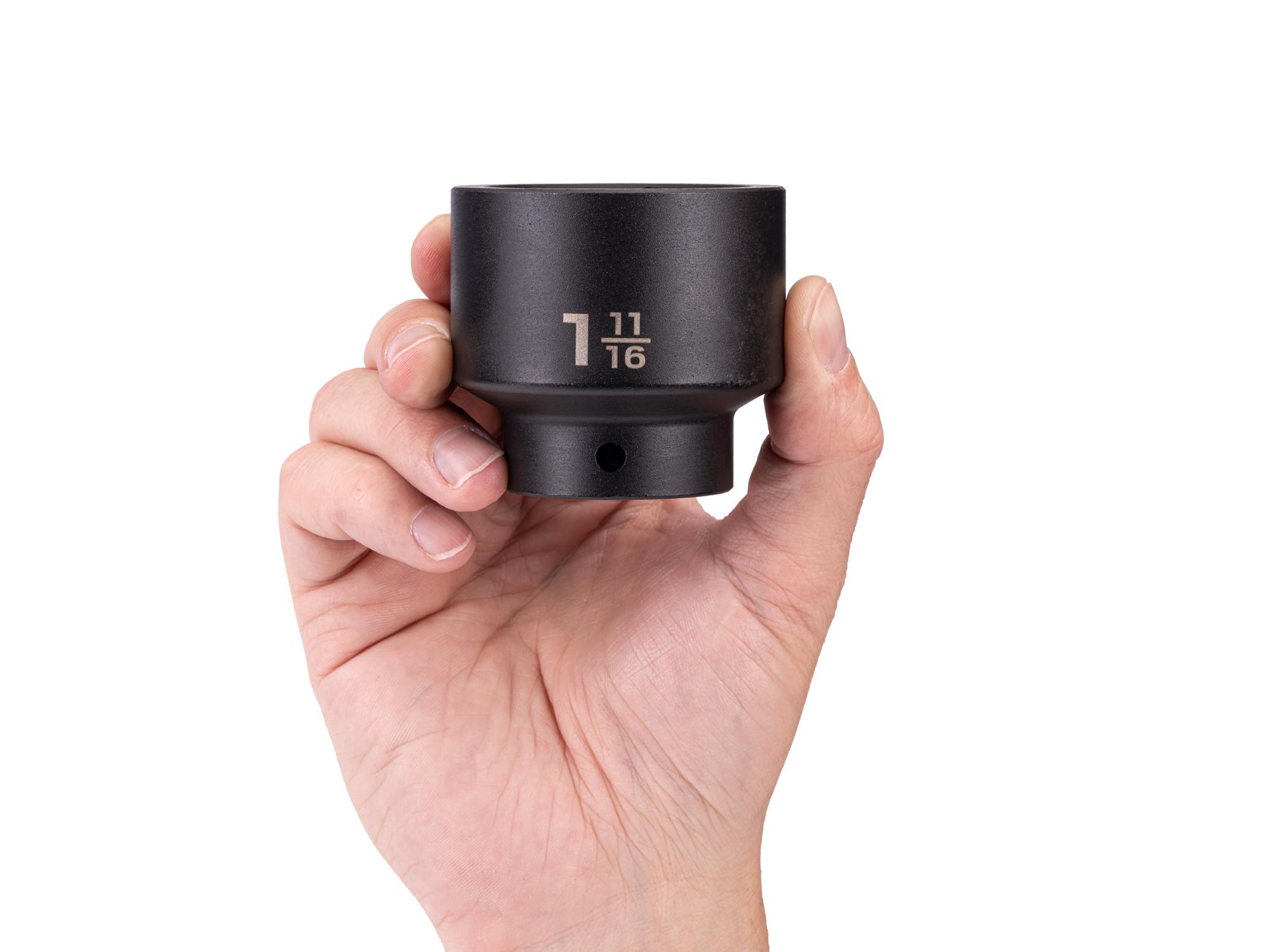 Person holding Tekton impact drive 6-point socket. Item #SID22043