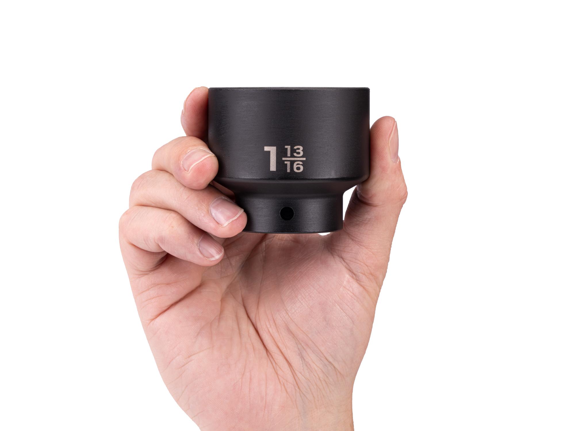 Person holding Tekton impact drive 6-point socket. Item #SID22046