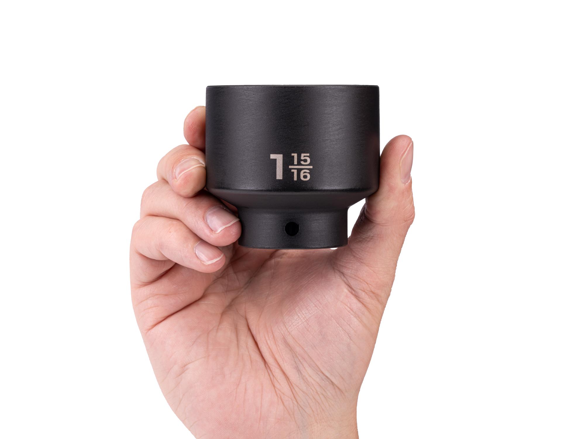 Person holding Tekton impact drive 6-point socket. Item #SID22049