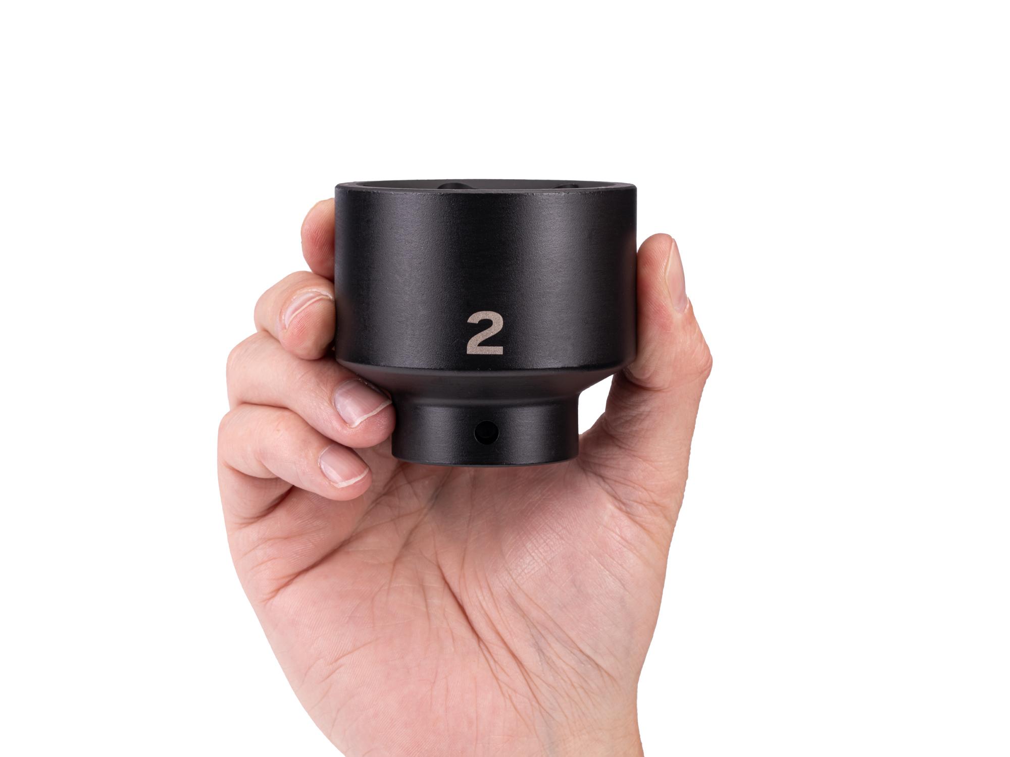Person holding Tekton impact drive 6-point socket. Item #SID22051