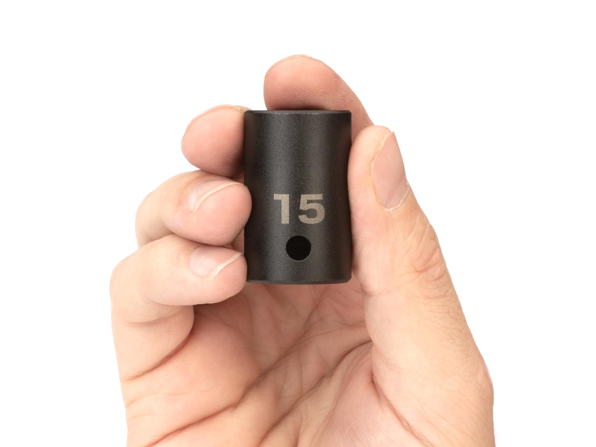 Person holding Tekton impact drive 6-point socket. Item #SID22115