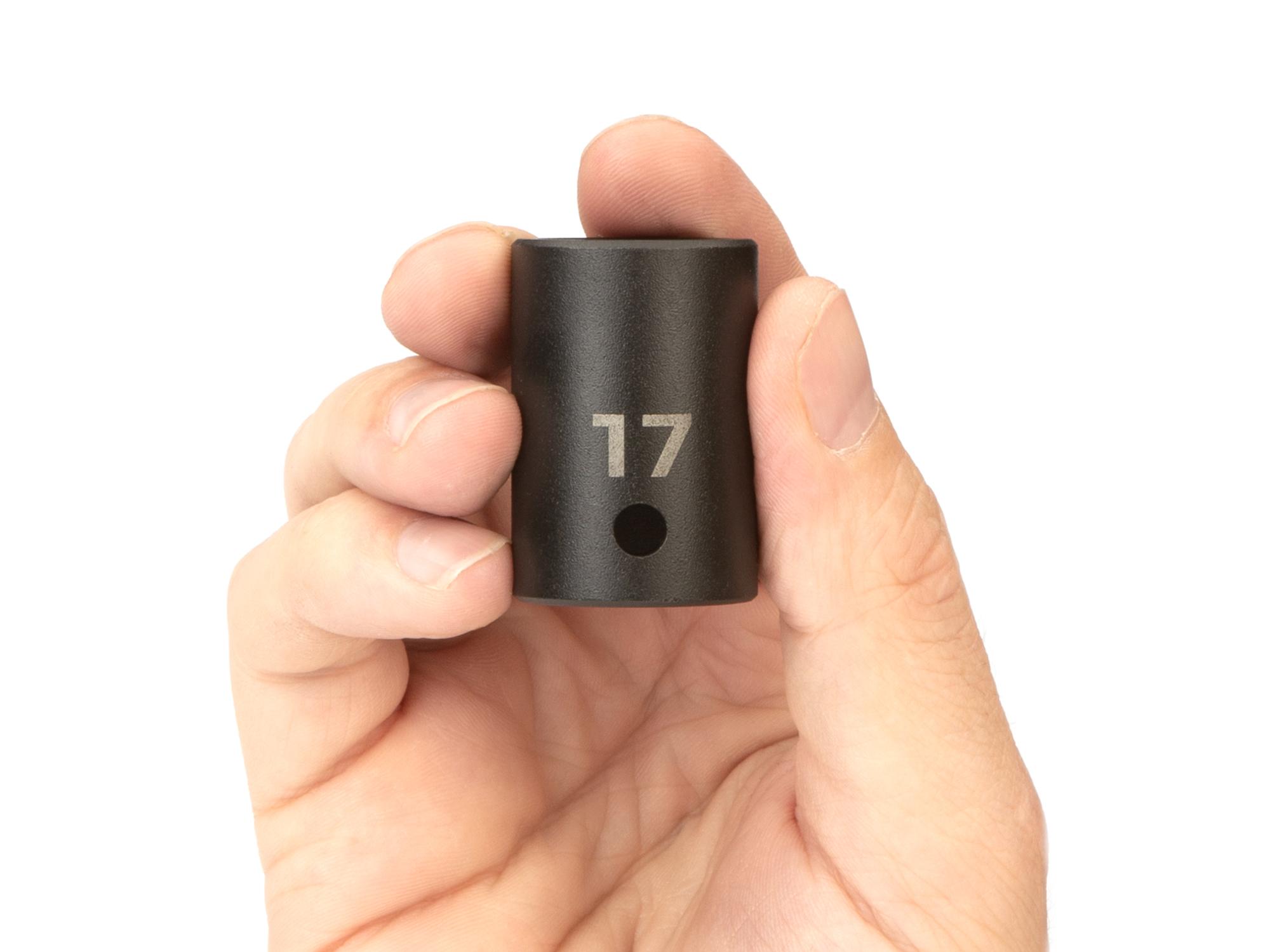 Person holding Tekton impact drive 6-point socket. Item #SID22117