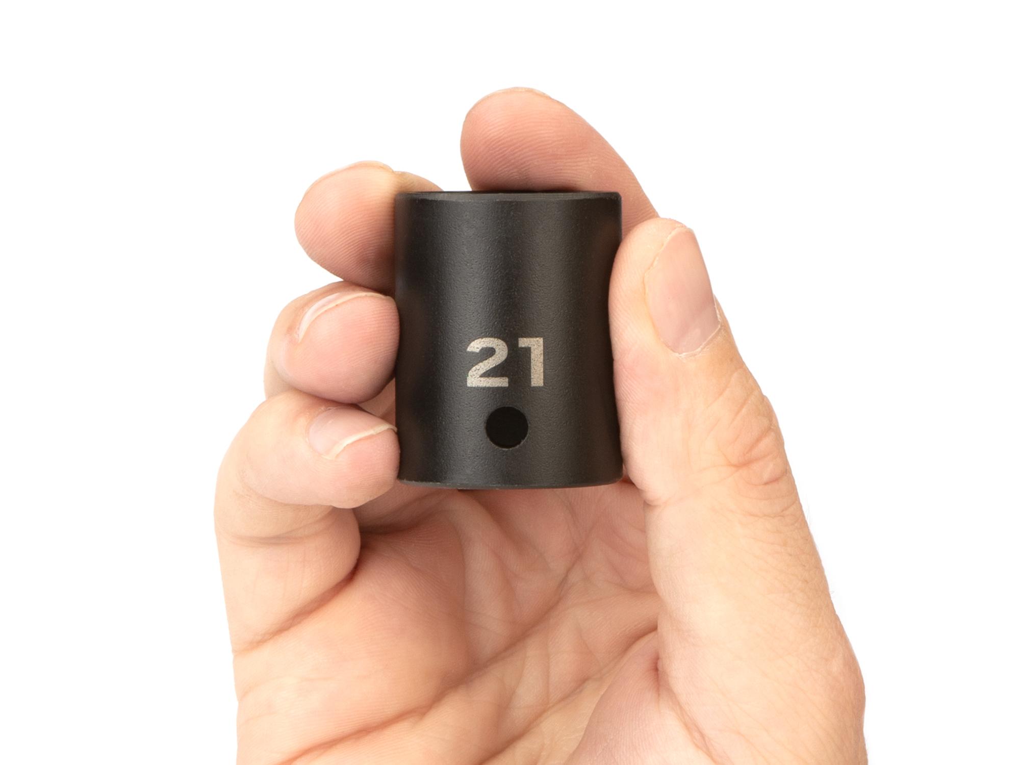 Person holding Tekton impact drive 6-point socket. Item #SID22121