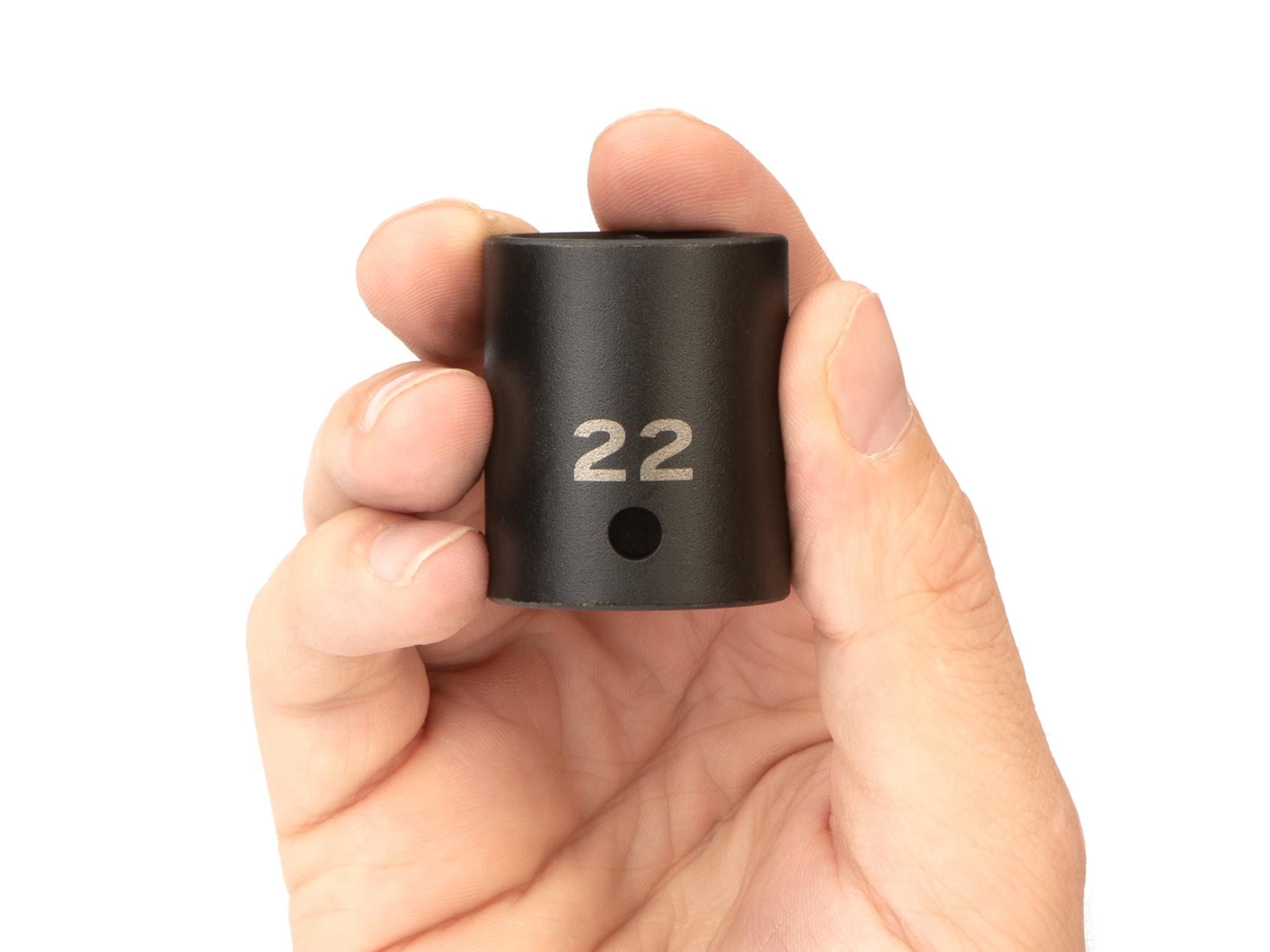 Person holding Tekton impact drive 6-point socket. Item #SID22122