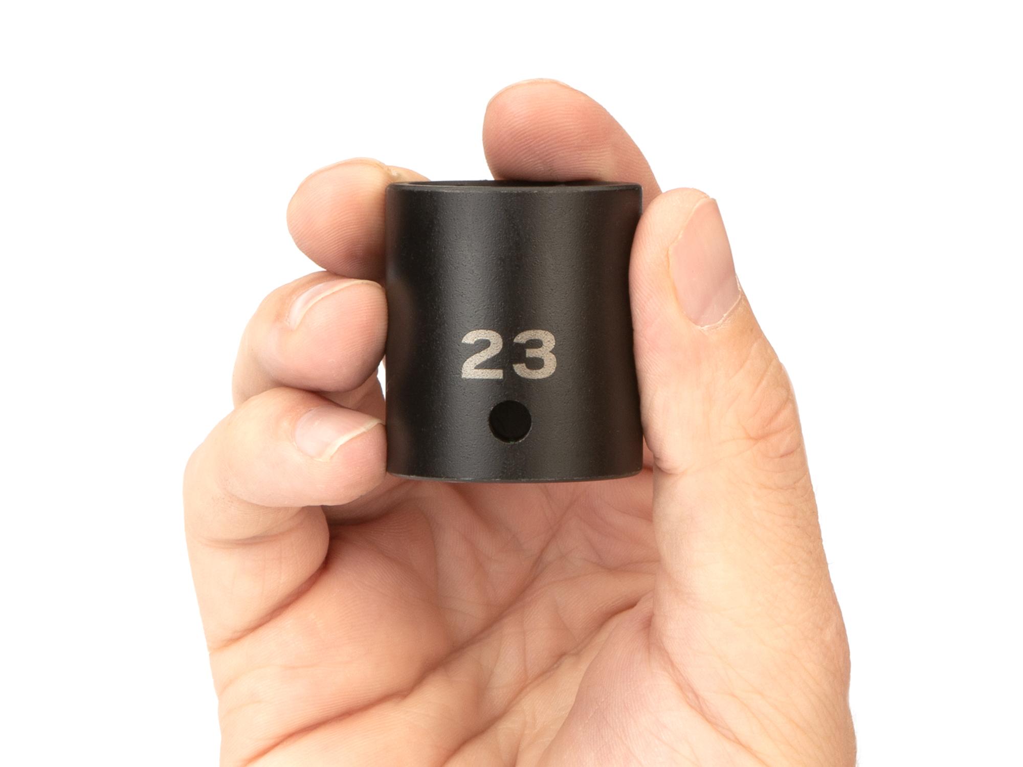 Person holding Tekton impact drive 6-point socket. Item #SID22123