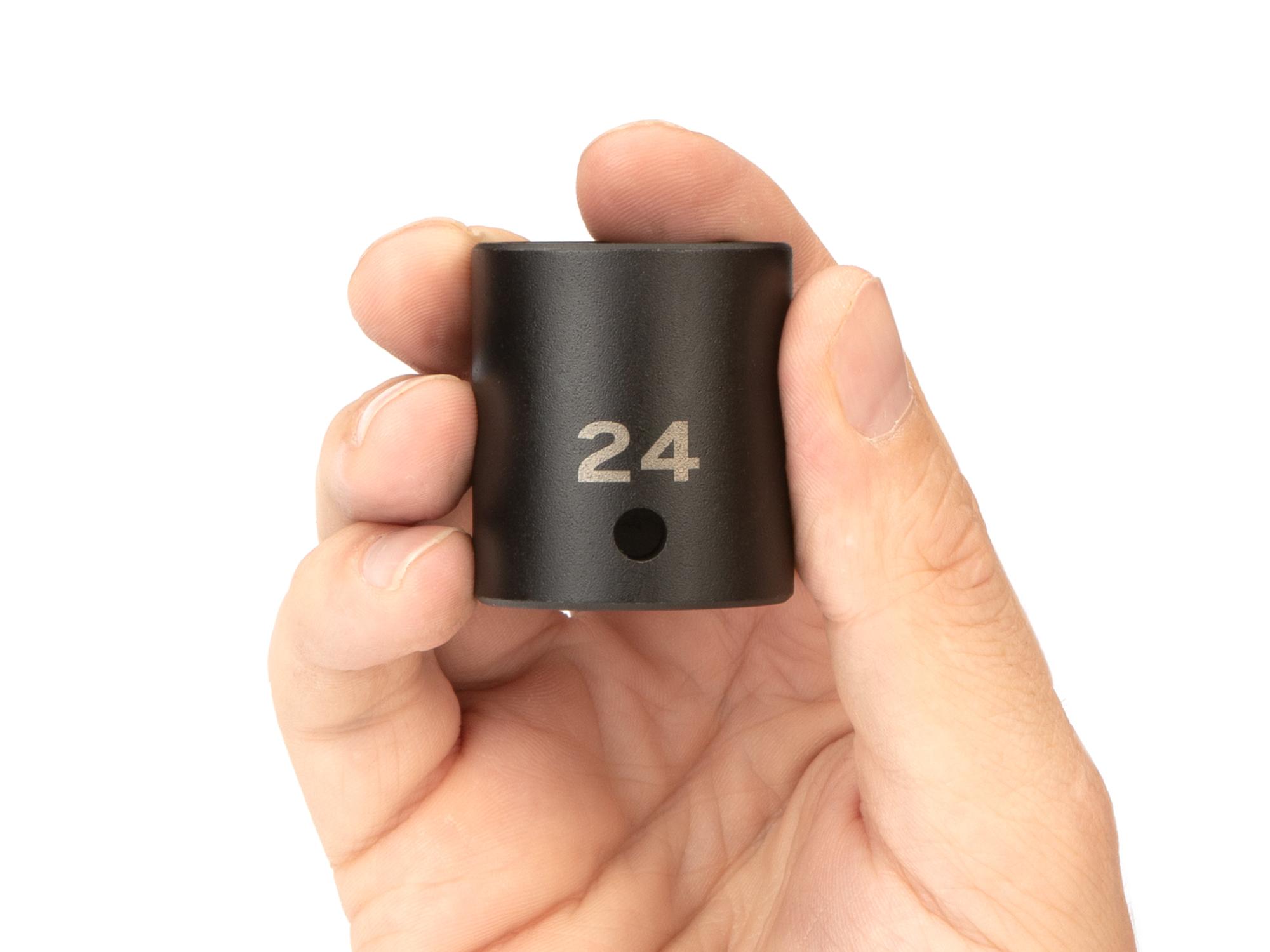 Person holding Tekton impact drive 6-point socket. Item #SID22124