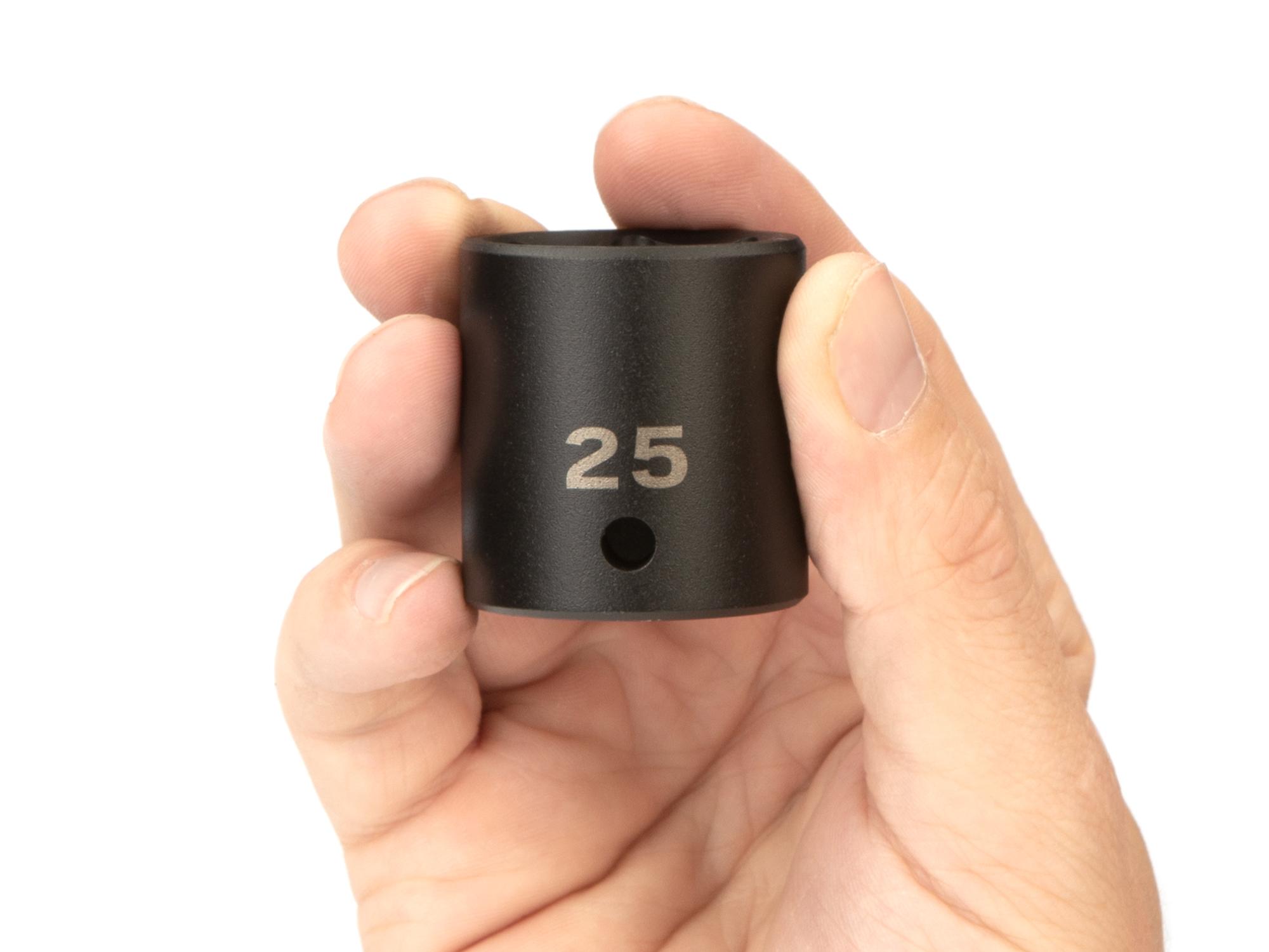 Person holding Tekton impact drive 6-point socket. Item #SID22125