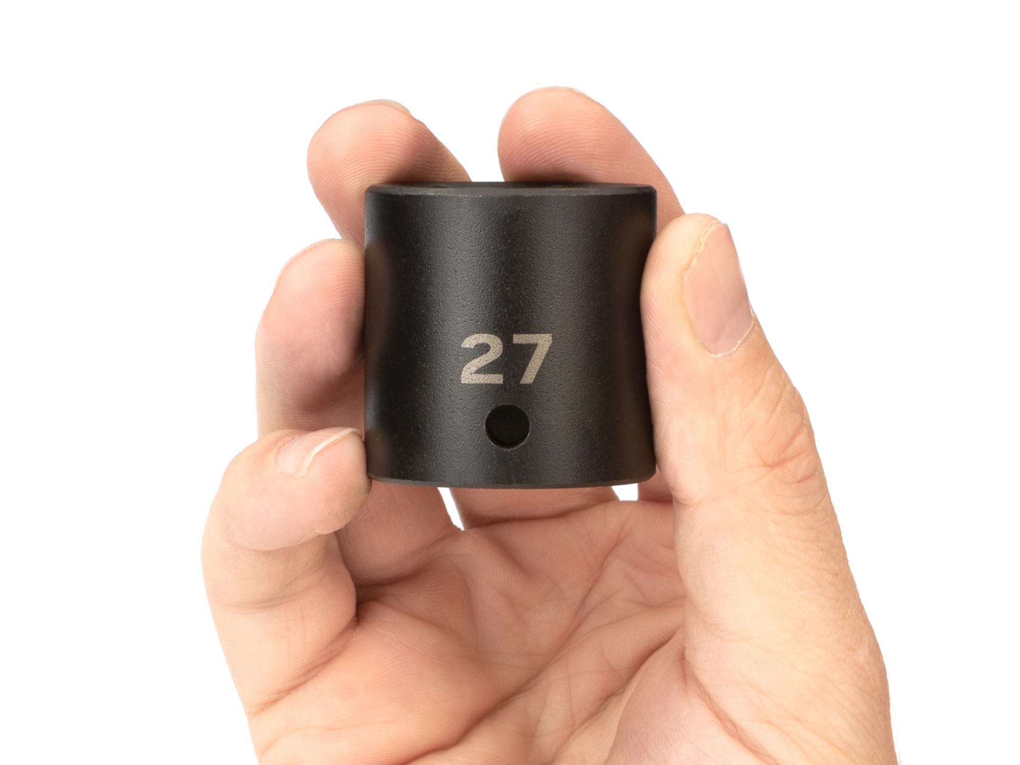 Person holding Tekton impact drive 6-point socket. Item #SID22127