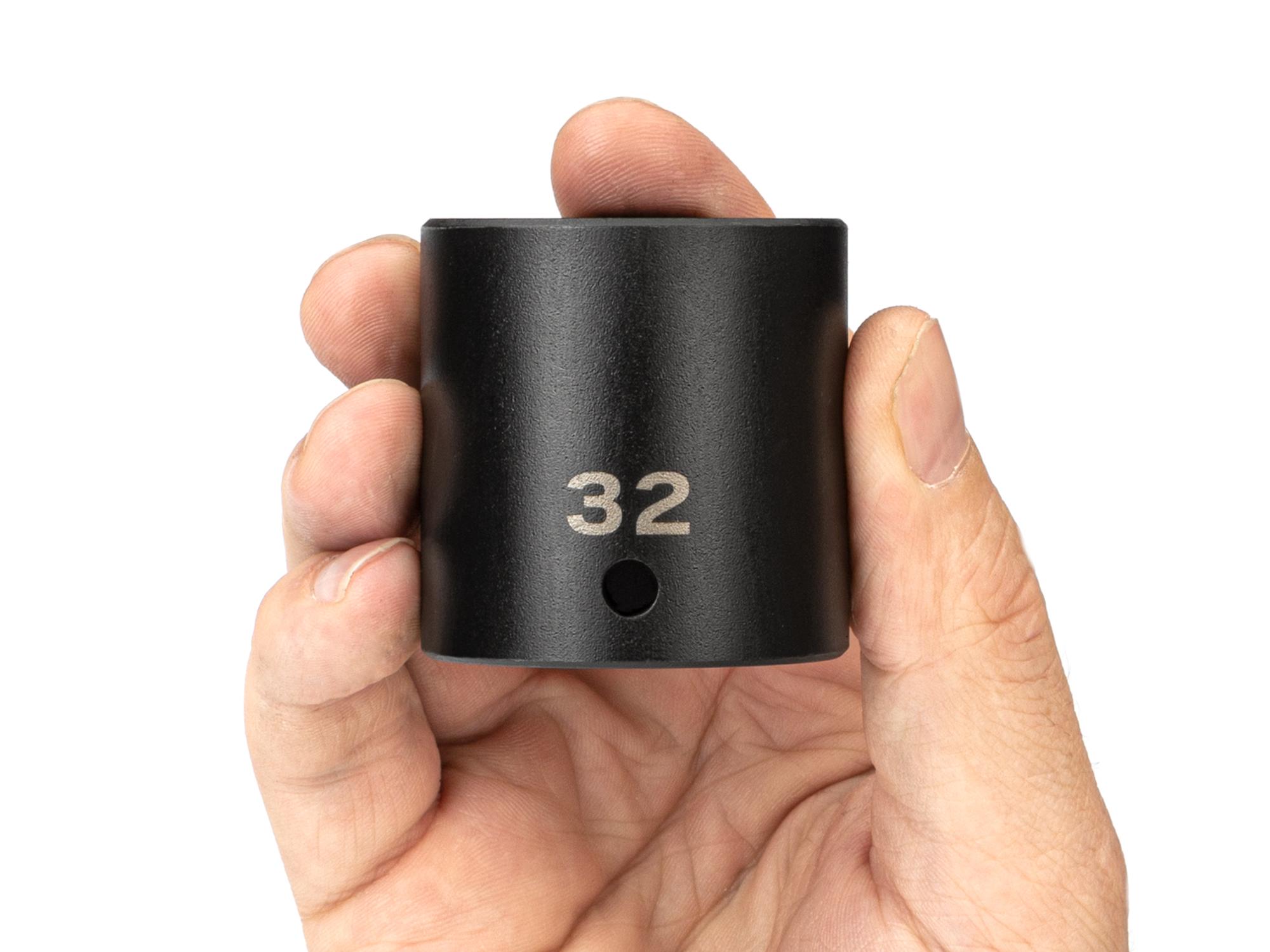 Person holding Tekton impact drive 6-point socket. Item #SID22132
