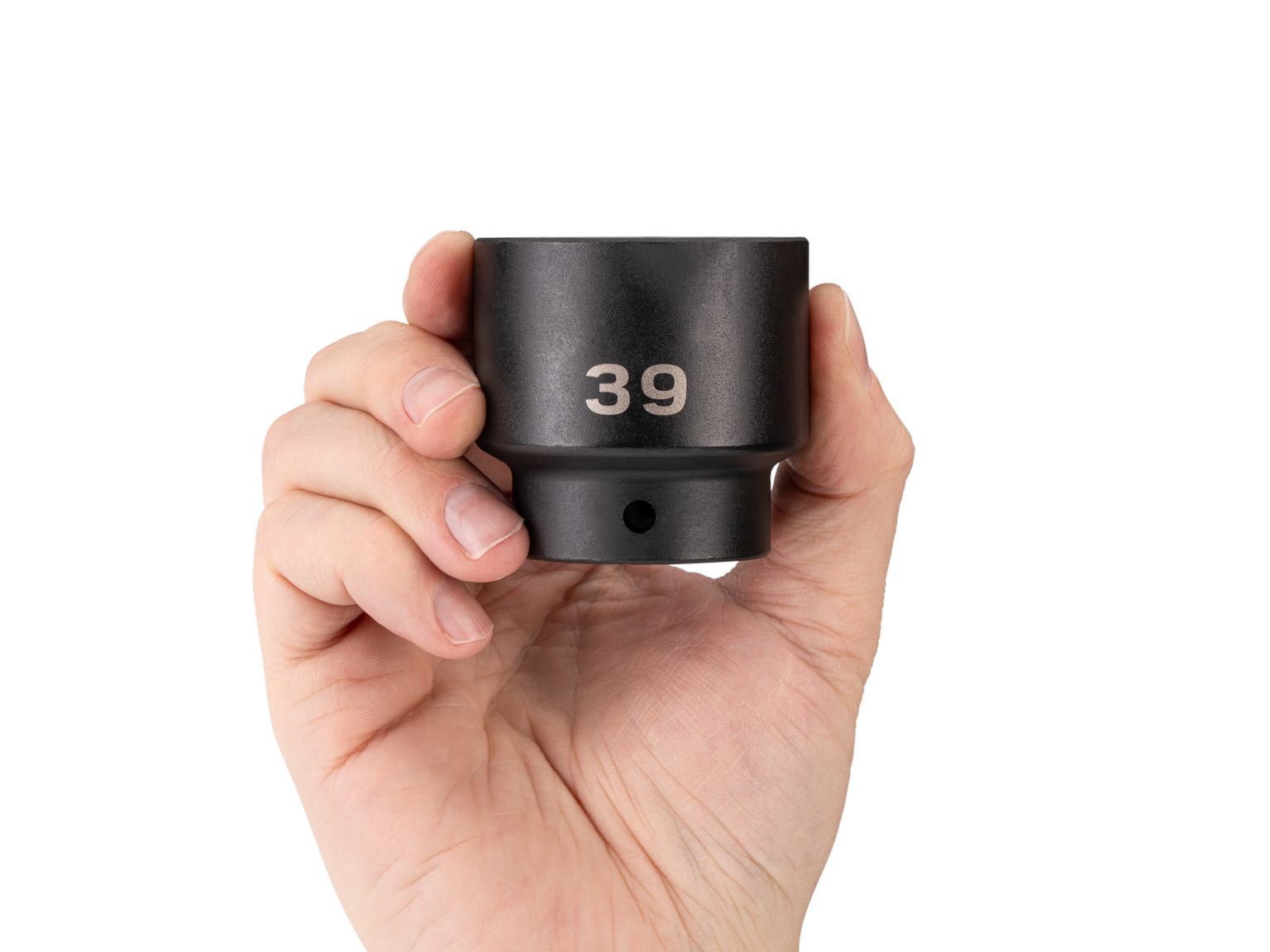 Person holding Tekton 39 millimeter impact drive 6-point socket. Item #SID22139