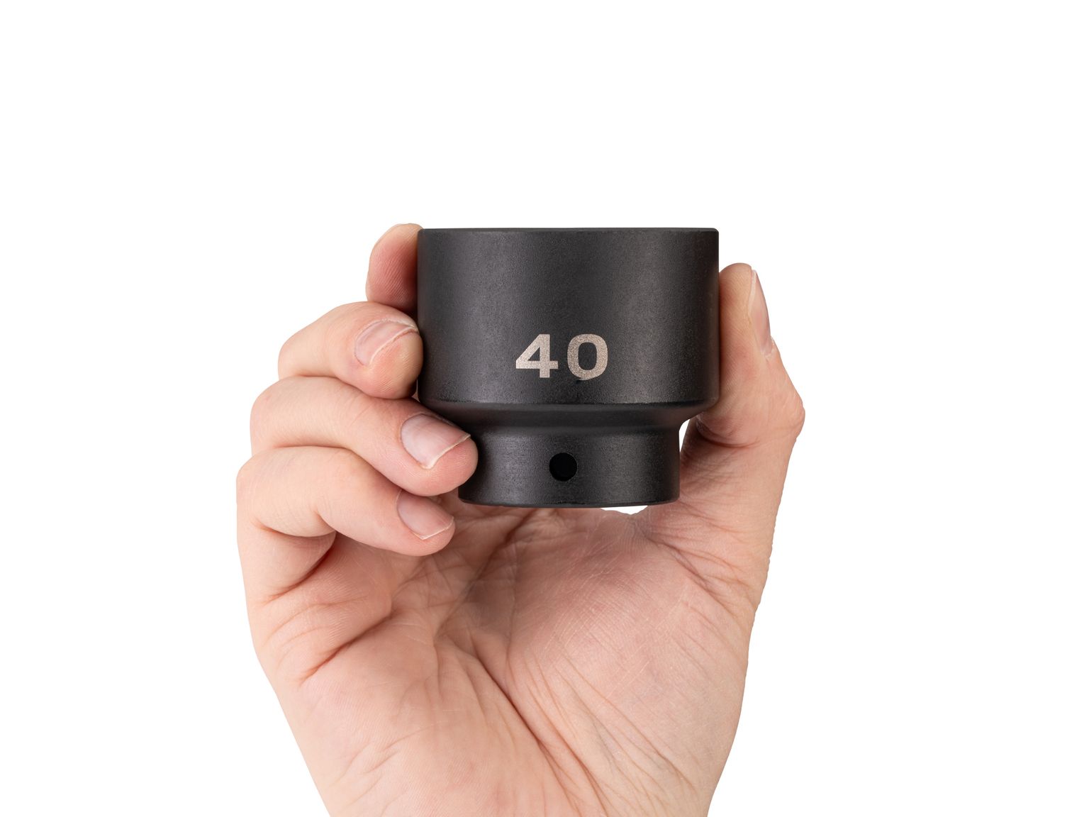 Person holding Tekton 40 millimeter impact drive 6-point socket. Item #SID22140