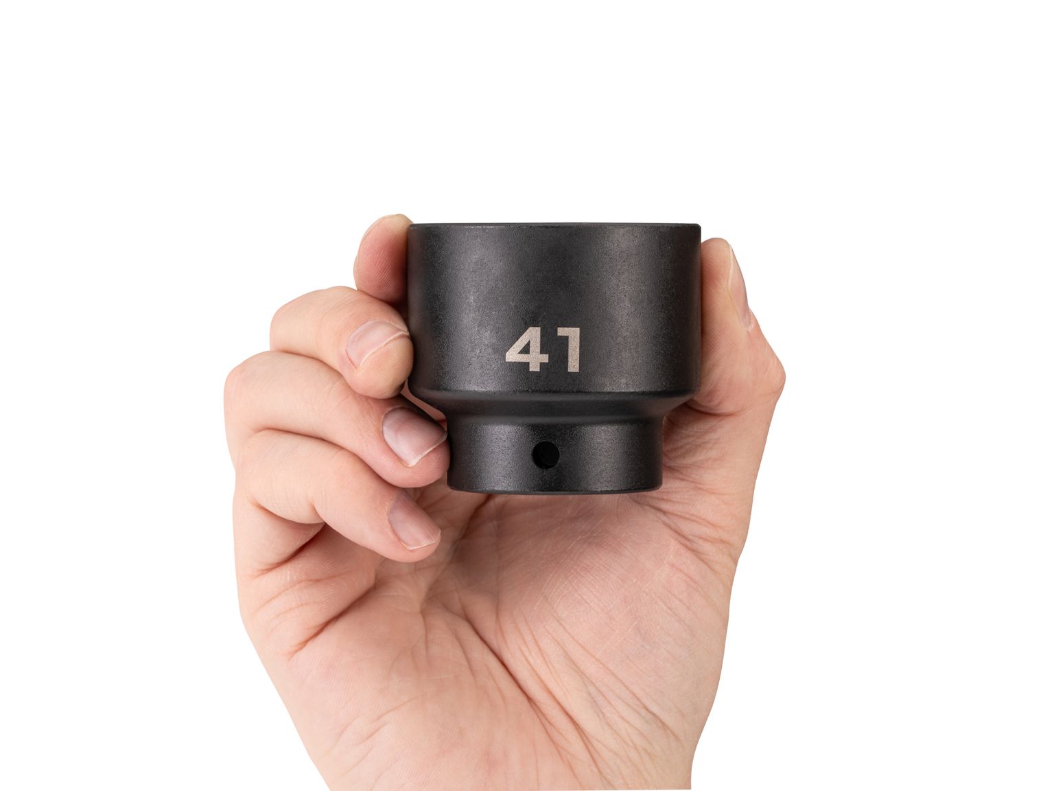 Person holding Tekton 41 millimeter impact drive 6-point socket. Item #SID22141