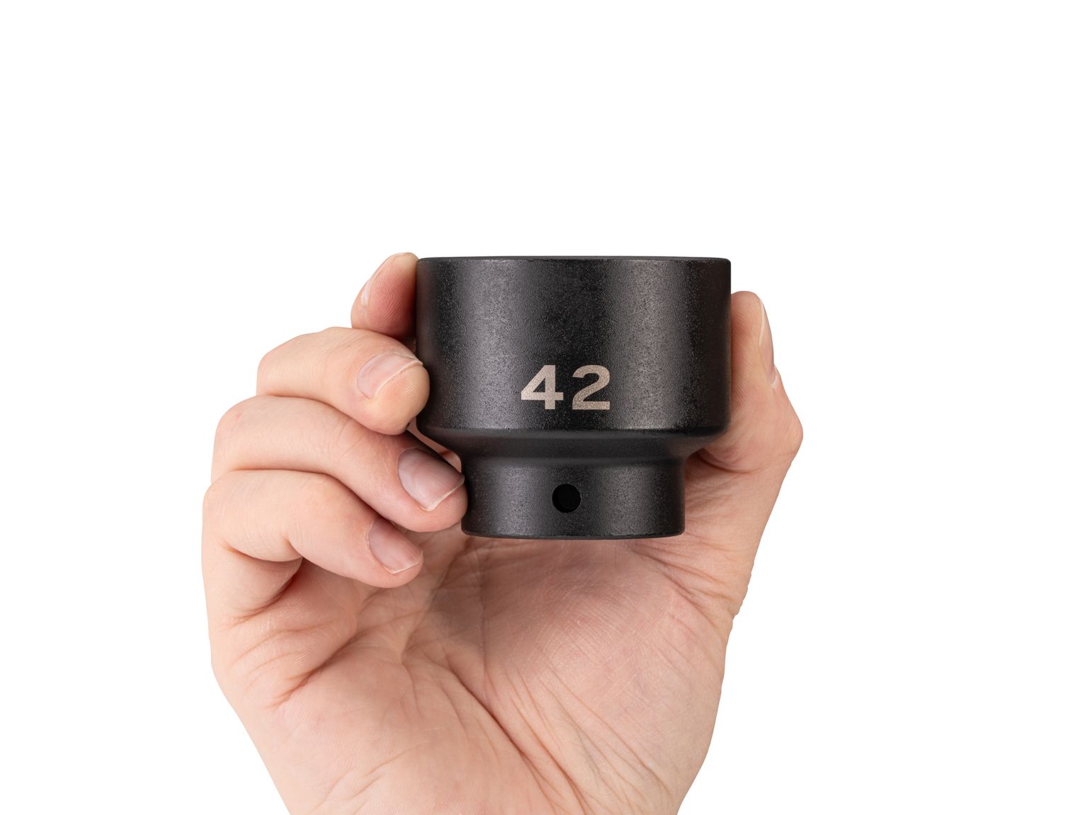 Person holding Tekton 42 millimeter impact drive 6-point socket. Item #SID22142